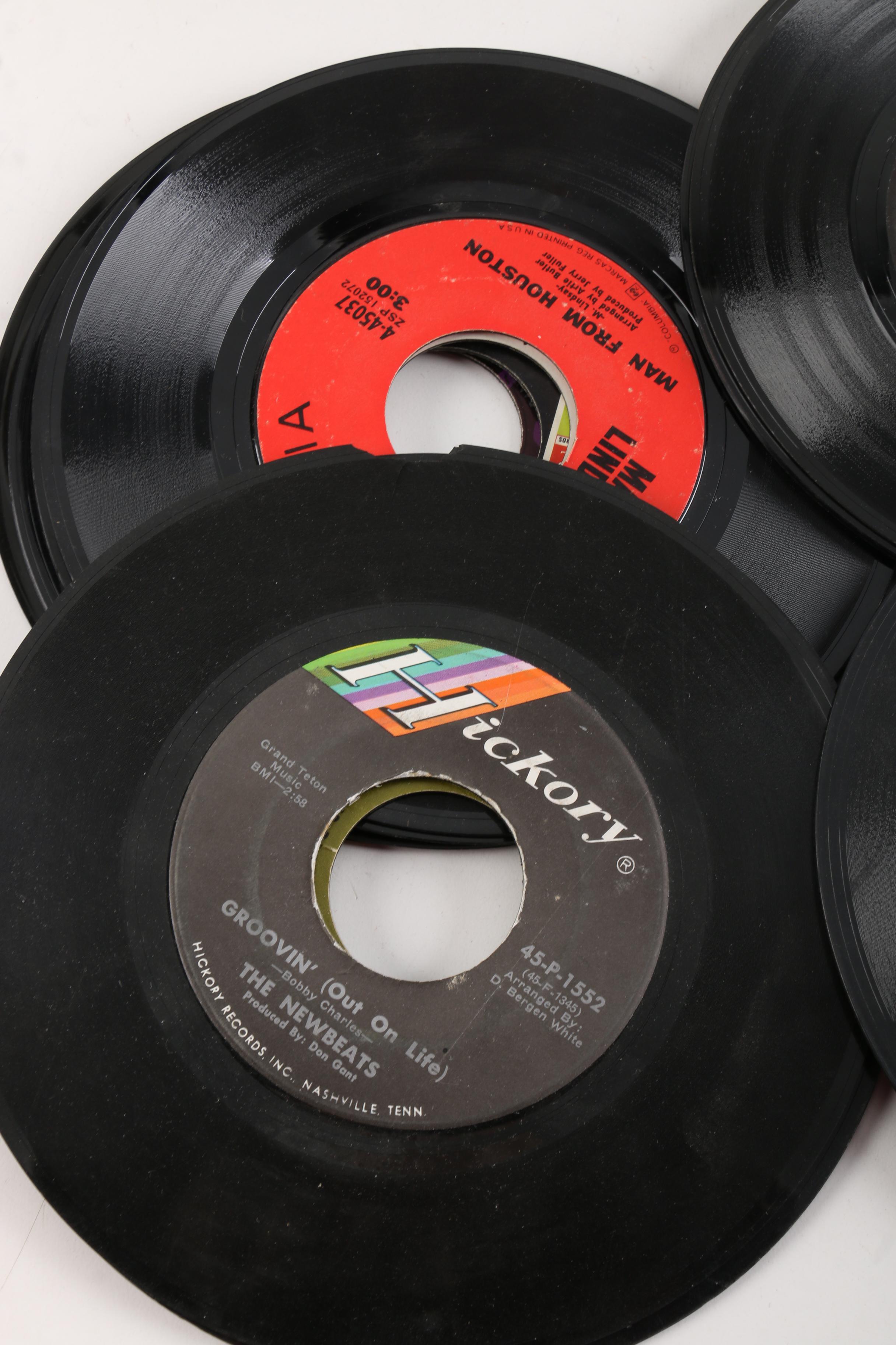 Vintage 45 RPM Records Including Dionne Warwick, Duran Duran, and Diana Ross