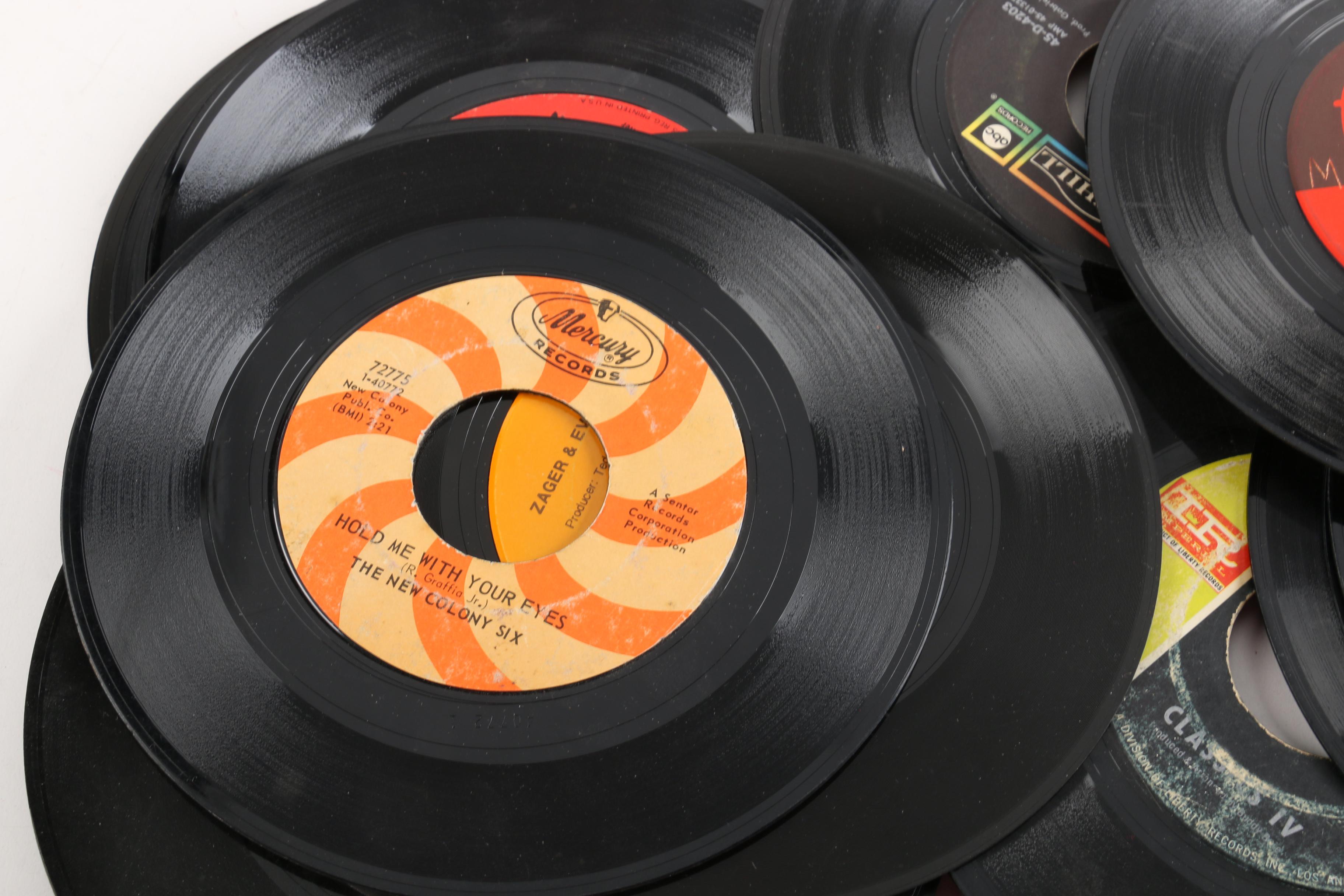 Vintage 45 RPM Records Including Dionne Warwick, Duran Duran, and Diana Ross