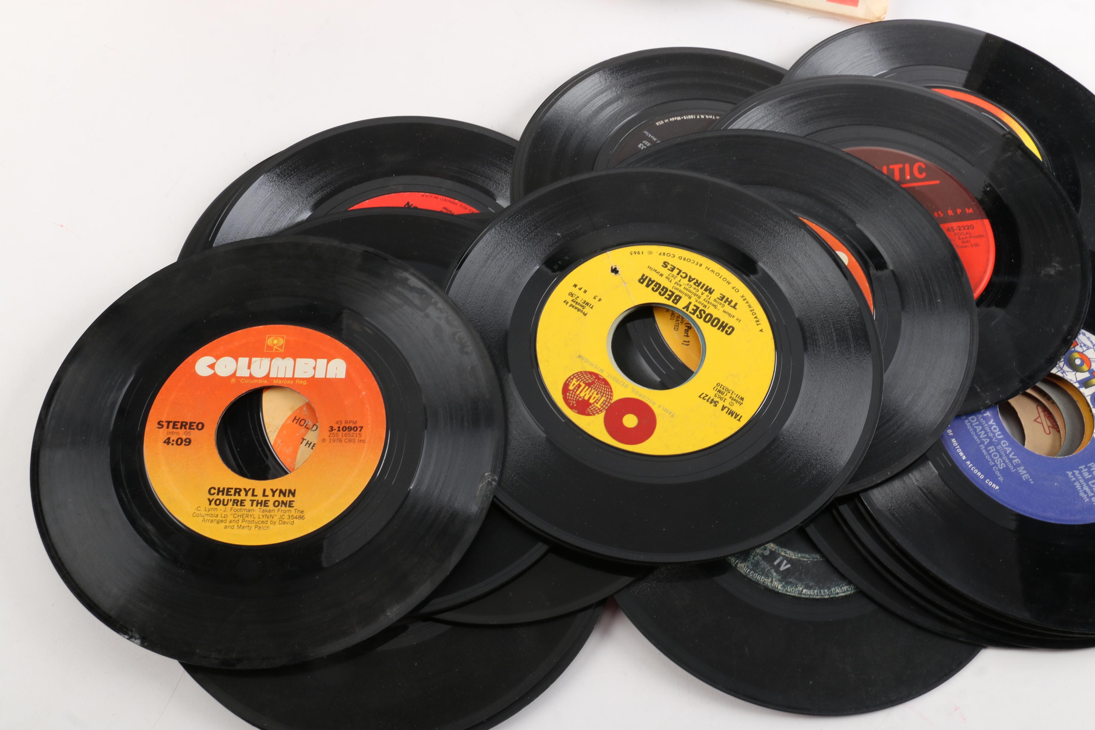Vintage 45 RPM Records Including Dionne Warwick, Duran Duran, and Diana Ross