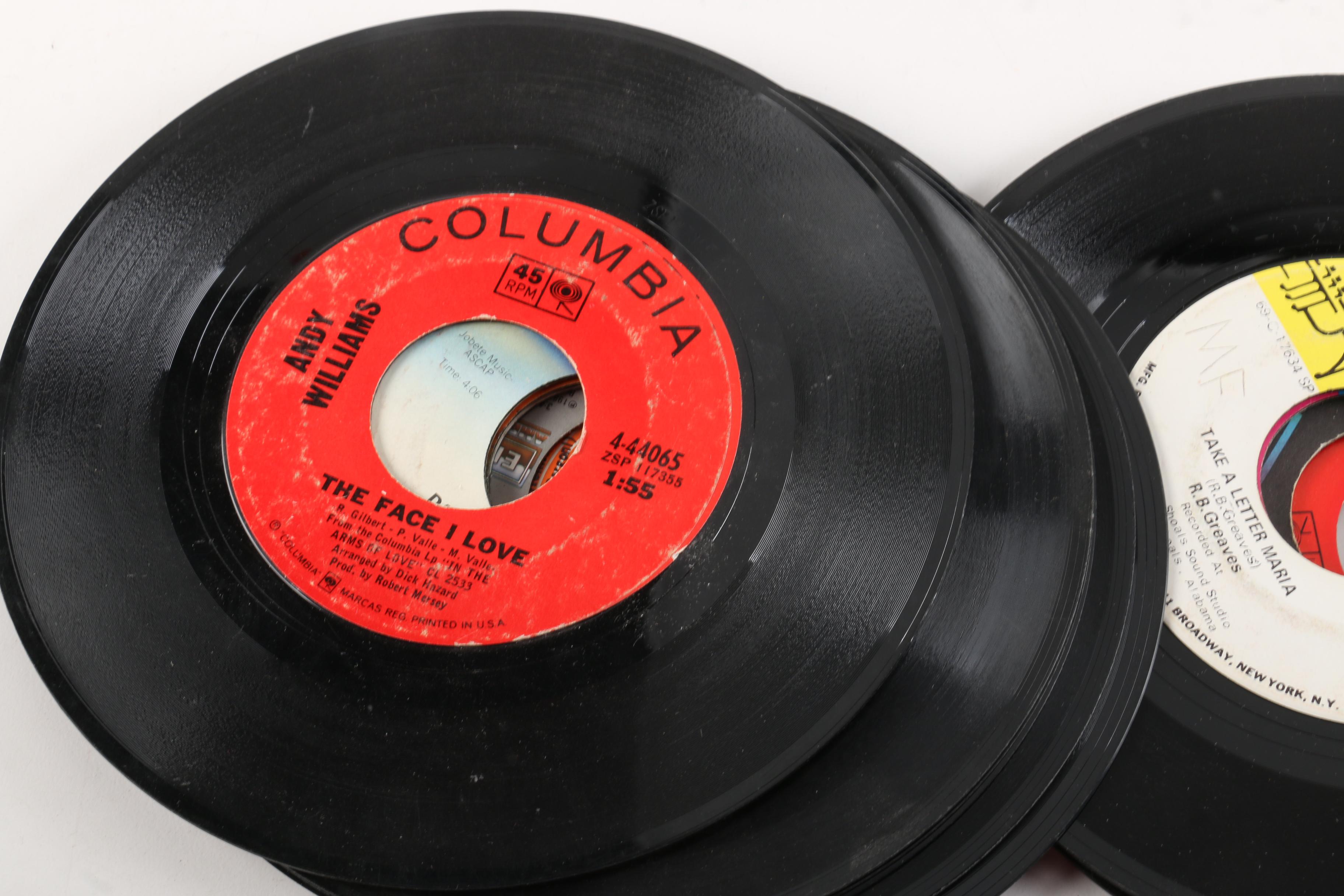 Vintage 45 RPM Records Including Dionne Warwick, Duran Duran, and Diana Ross