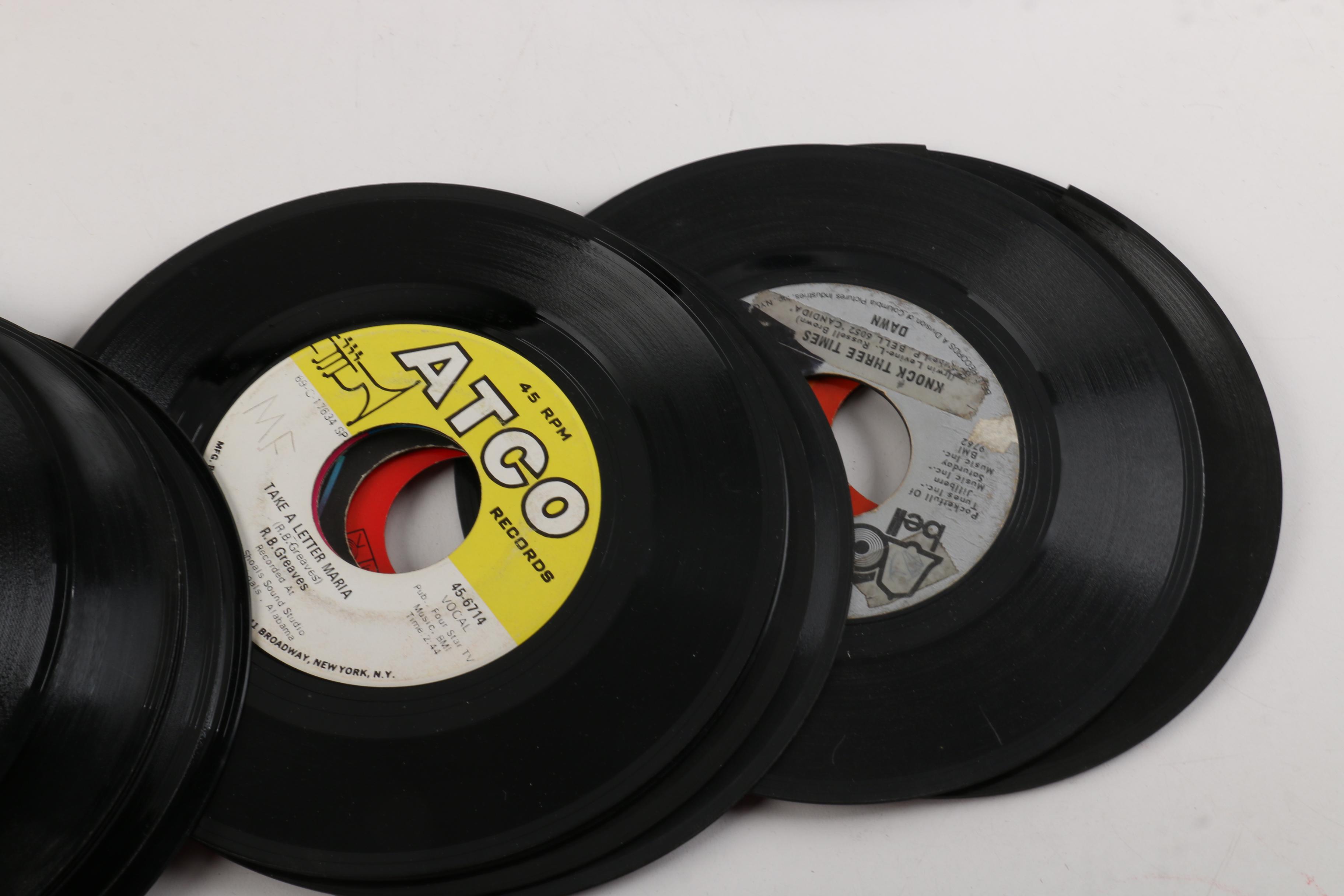 Vintage 45 RPM Records Including Dionne Warwick, Duran Duran, and Diana Ross