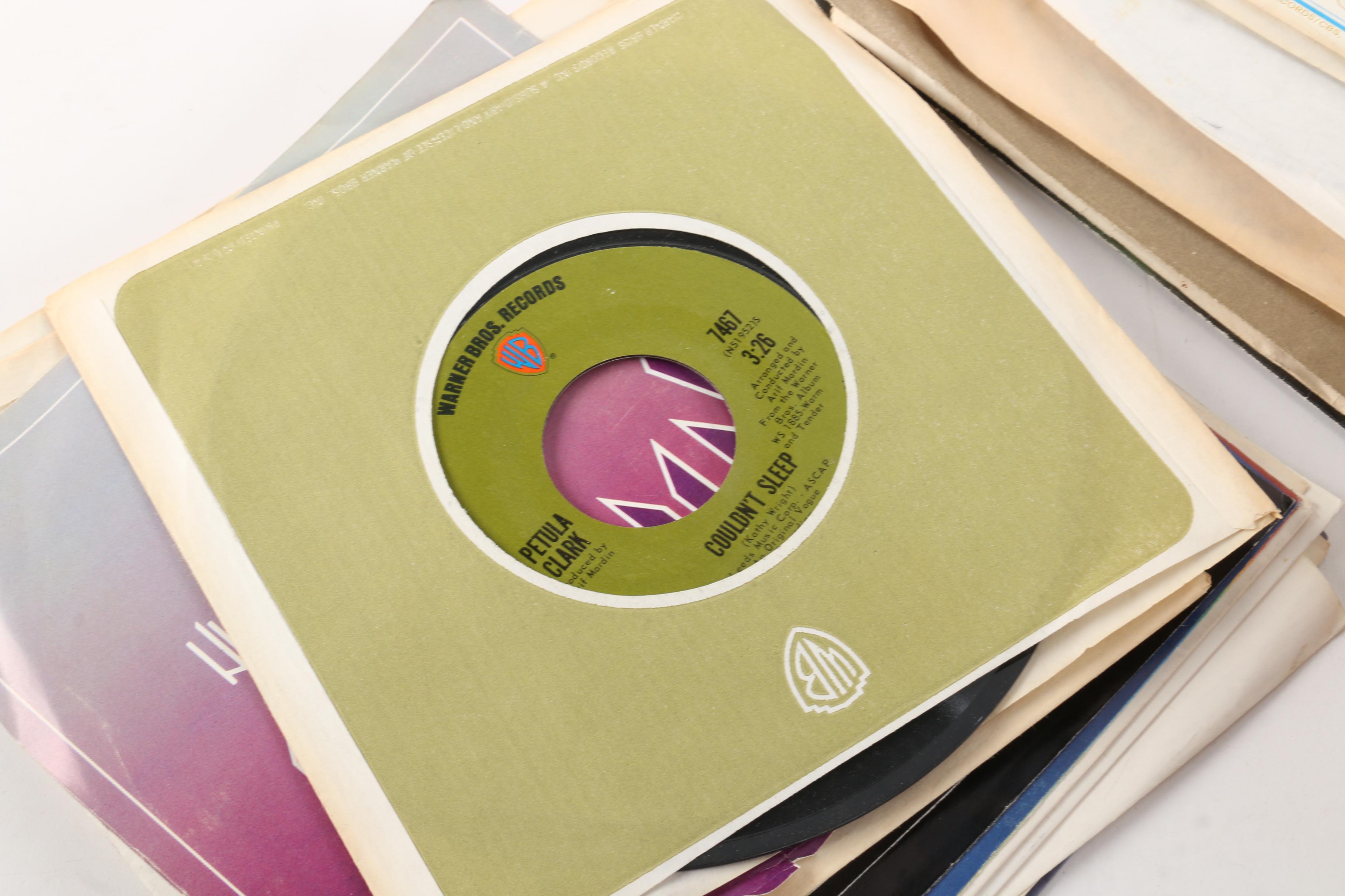 Vintage 45 RPM Records Including Dionne Warwick, Duran Duran, and Diana Ross