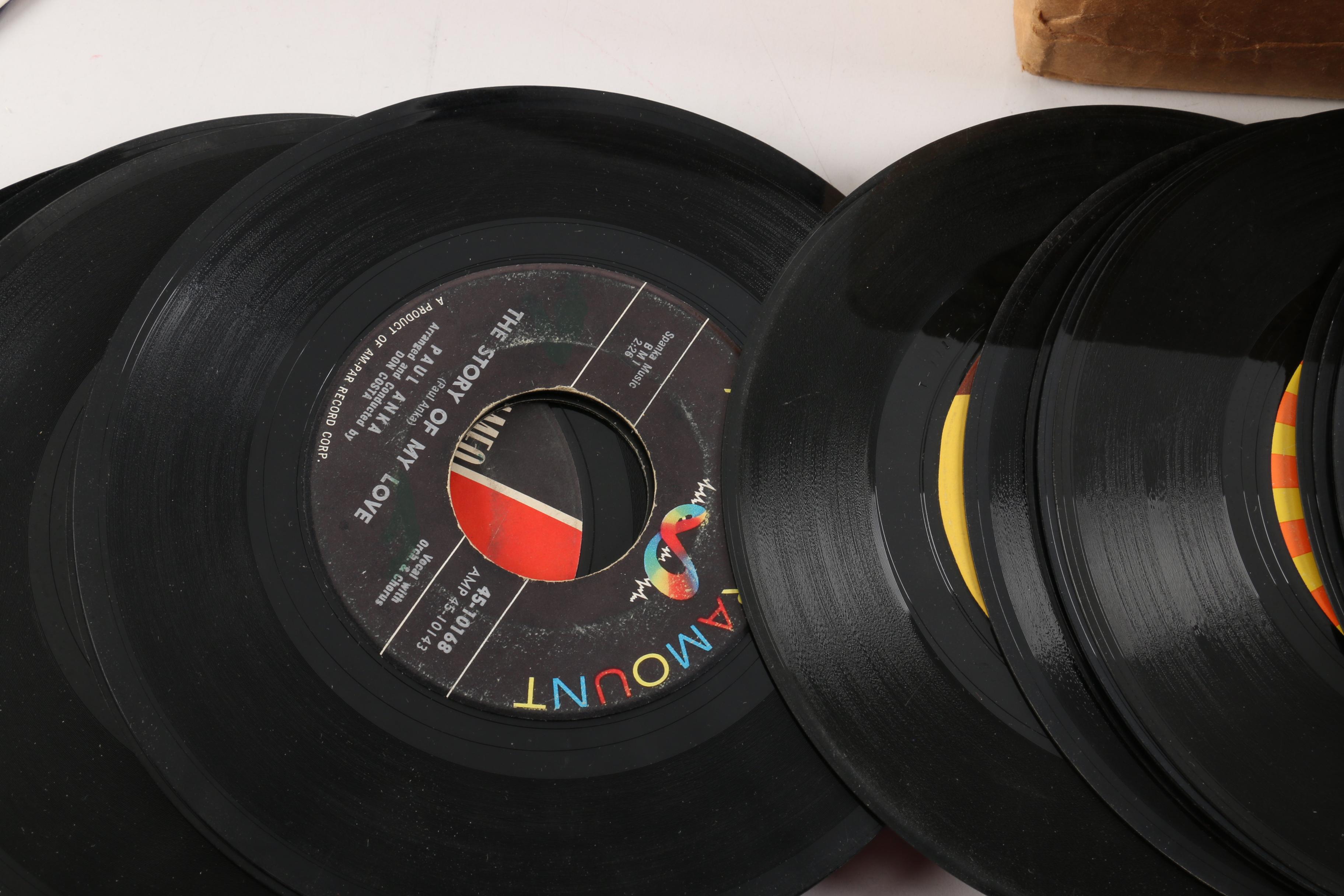 Vintage 45 RPM Records Including Dionne Warwick, Duran Duran, and Diana Ross