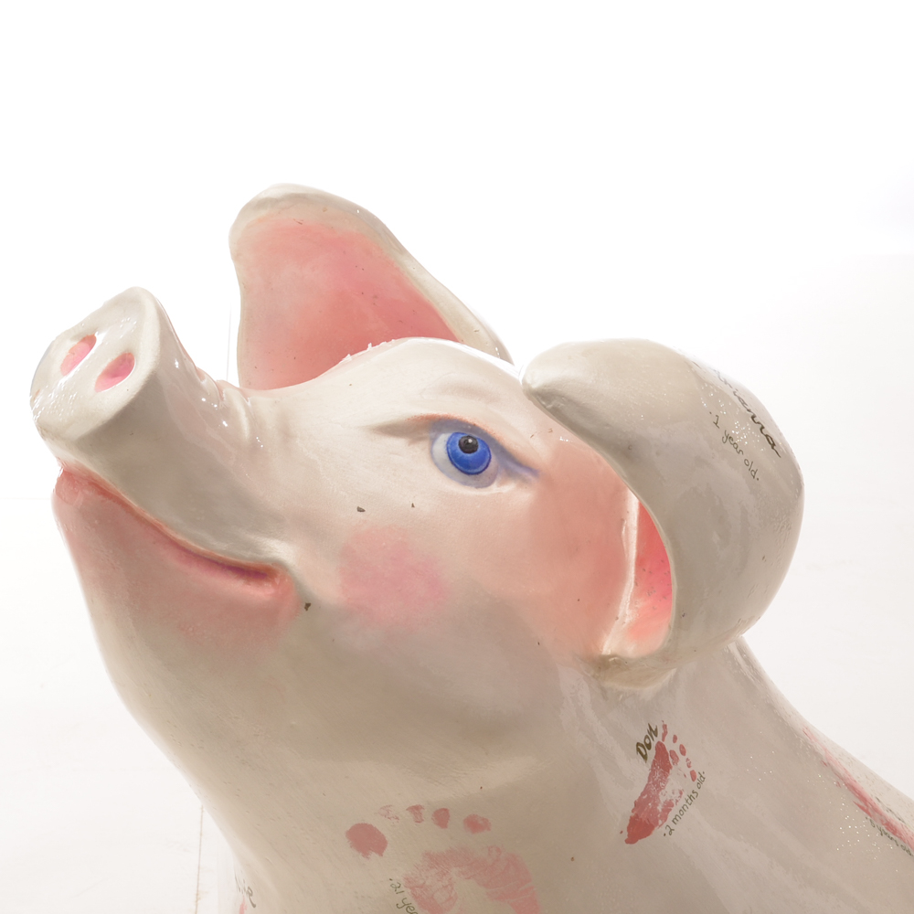 Cincinnati's "Big Pig Gig" Sitting Sculpture