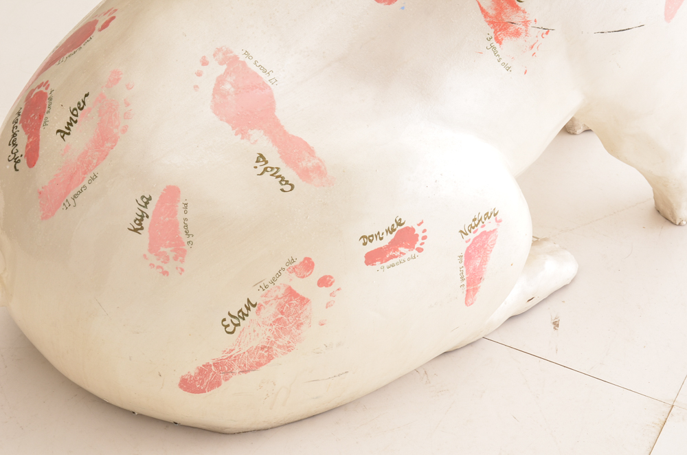 Cincinnati's "Big Pig Gig" Sitting Sculpture