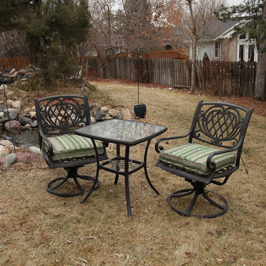 Pair of Patio Swivel Chairs and Table