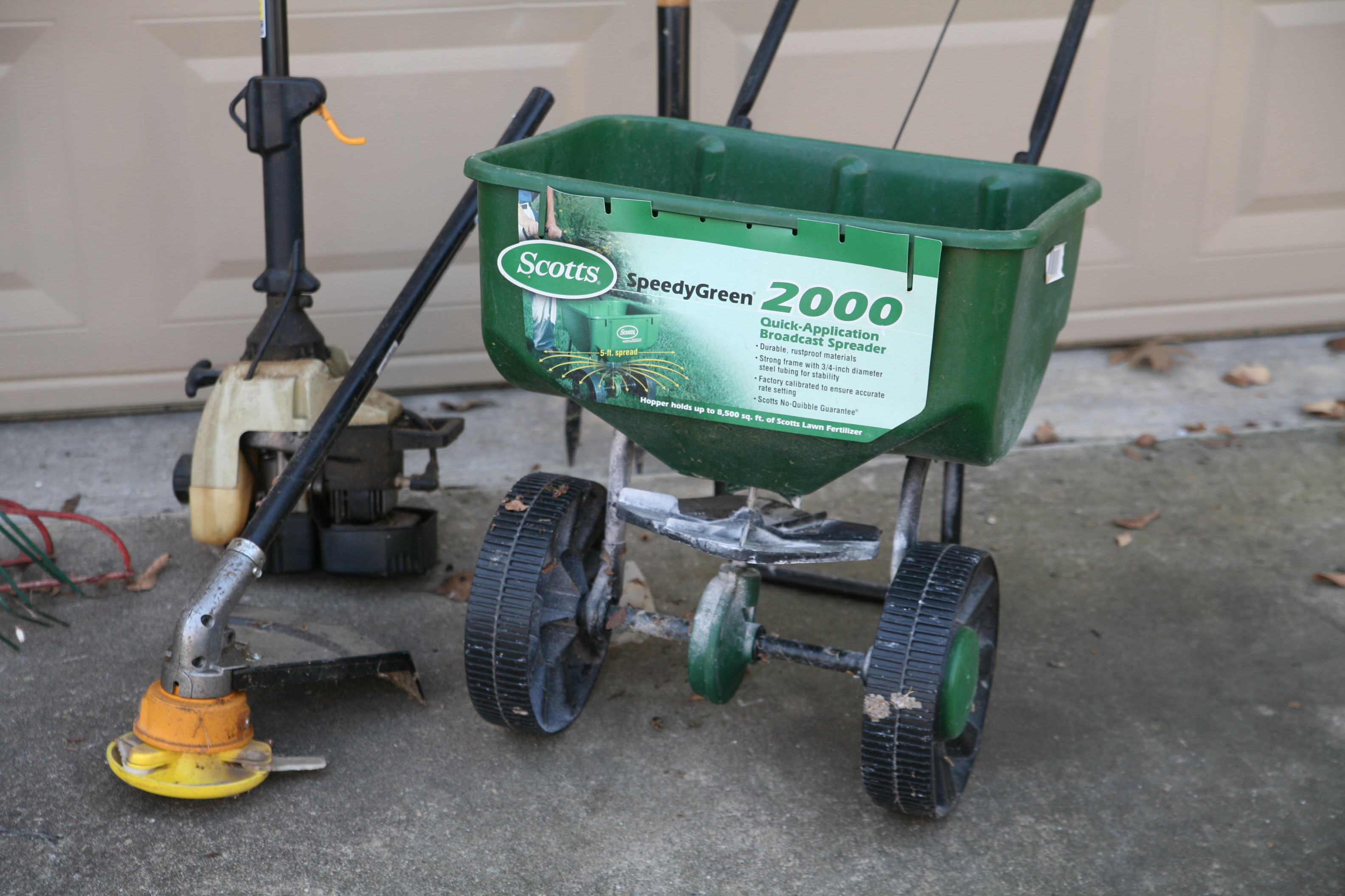 Landscaping Tools Including Trimmer, Rakes and Broadcast Spreader