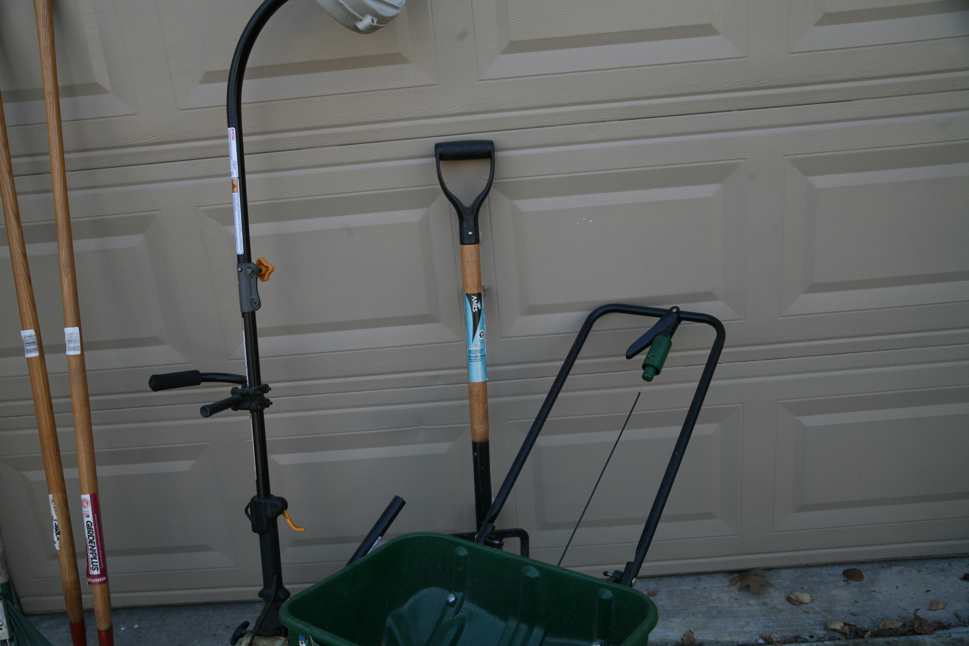 Landscaping Tools Including Trimmer, Rakes and Broadcast Spreader