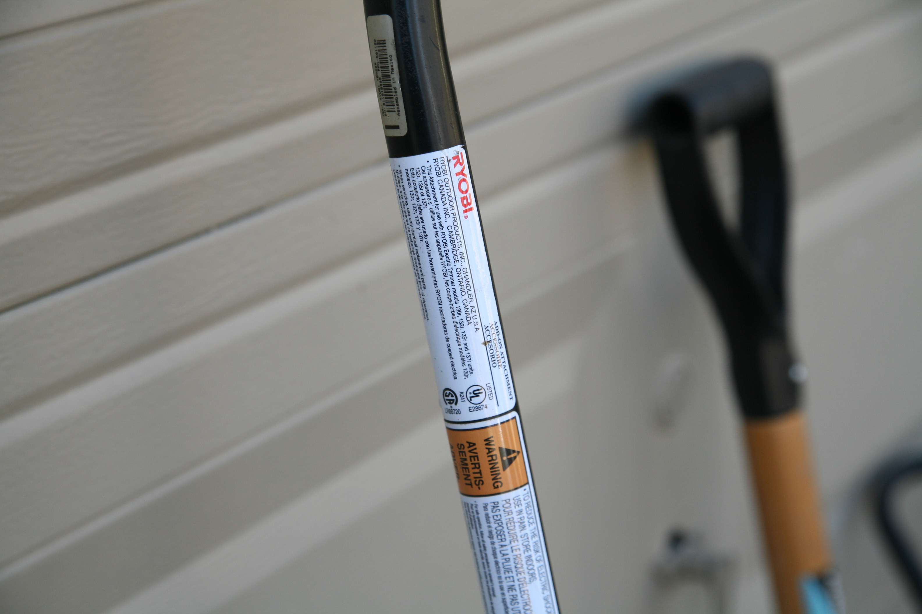 Landscaping Tools Including Trimmer, Rakes and Broadcast Spreader