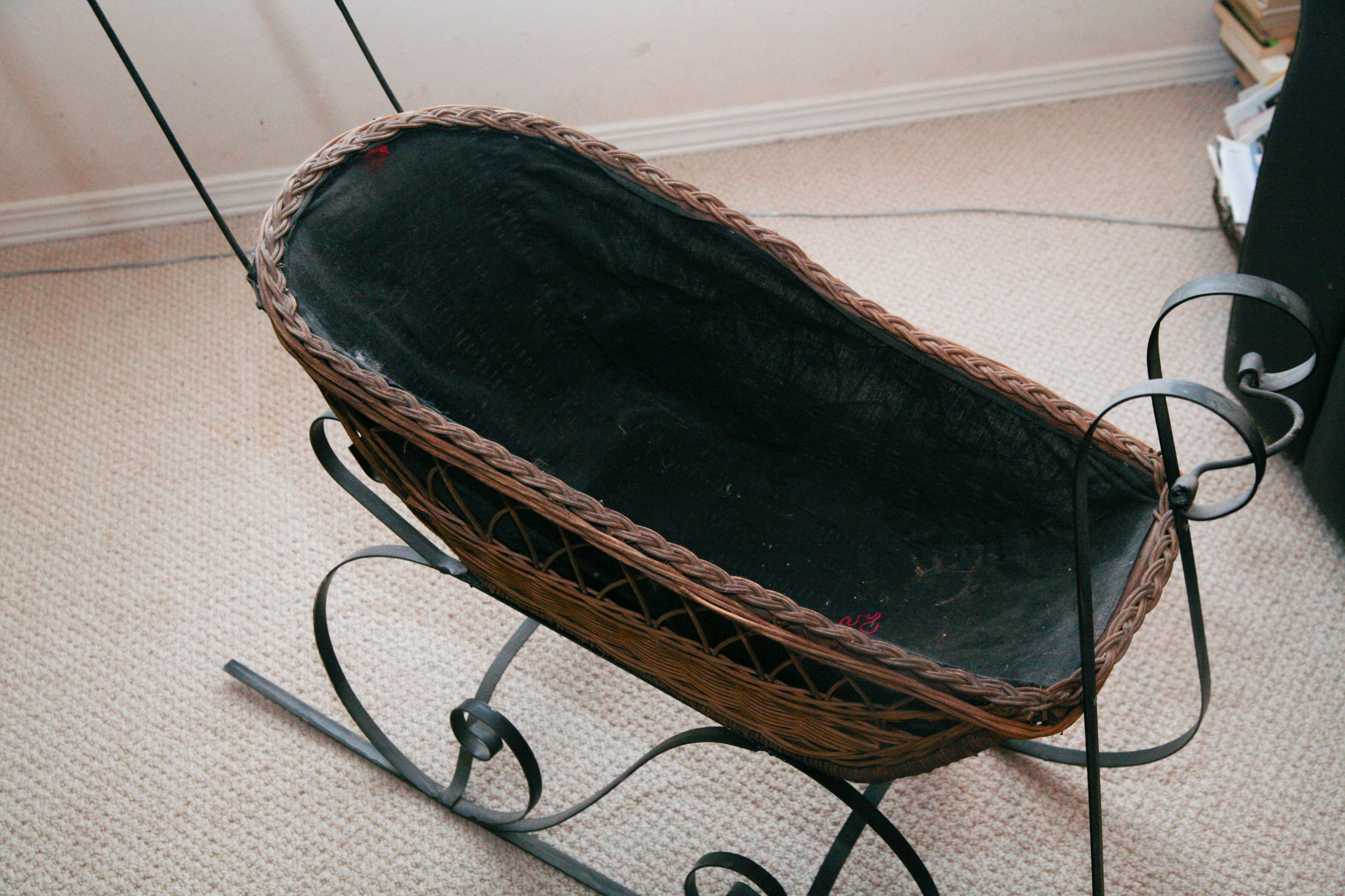 Pair of Baskets with Wrought Iron Sleigh Frame