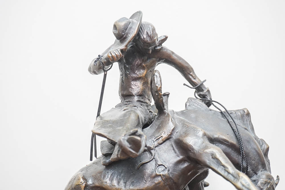 Bronze Sculpture After C.M. Russell "Bronco Twister"