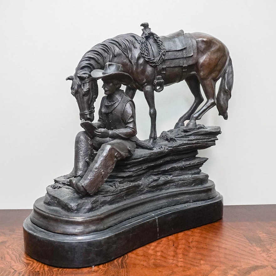 Bronze Sculpture of a Cowboy and Horse
