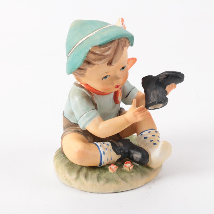 Erick Stauffer Figurine of a Boy Sitting with His Shoe Off
