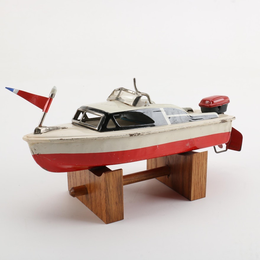 Vintage Wind-Up Speed Boat Toy With Stand