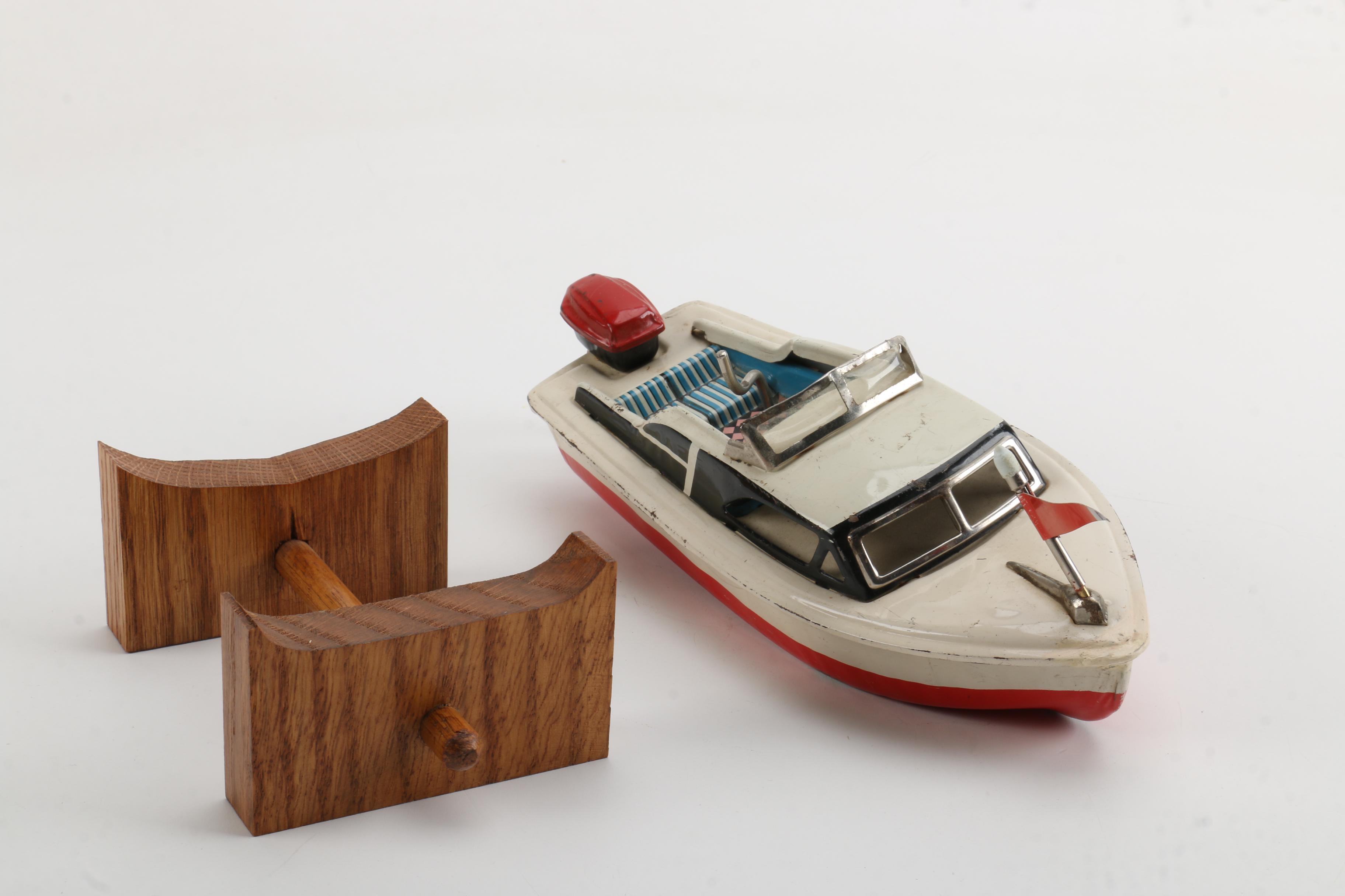 Vintage Wind-Up Speed Boat Toy With Stand