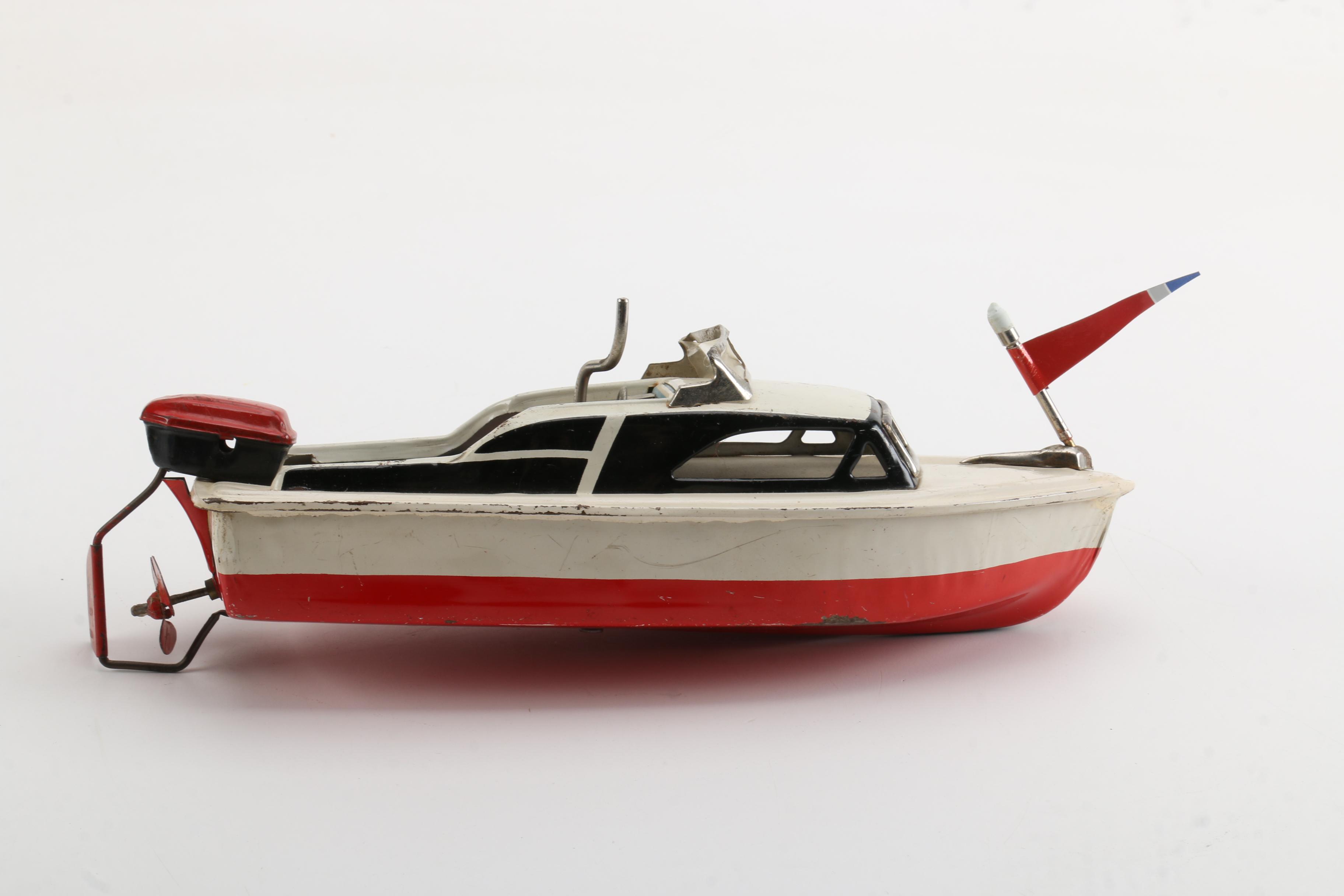 Vintage Wind-Up Speed Boat Toy With Stand