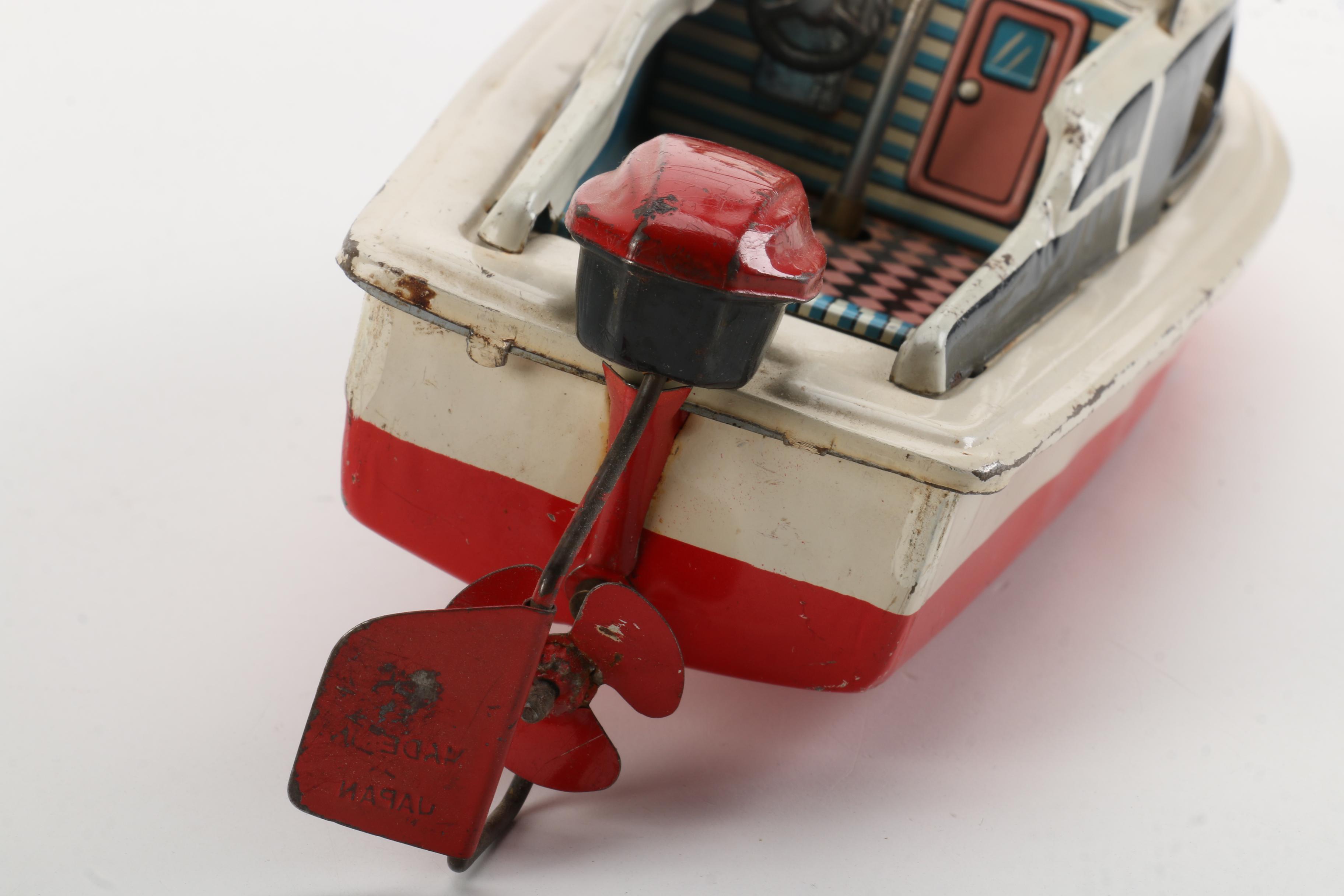 Vintage Wind-Up Speed Boat Toy With Stand