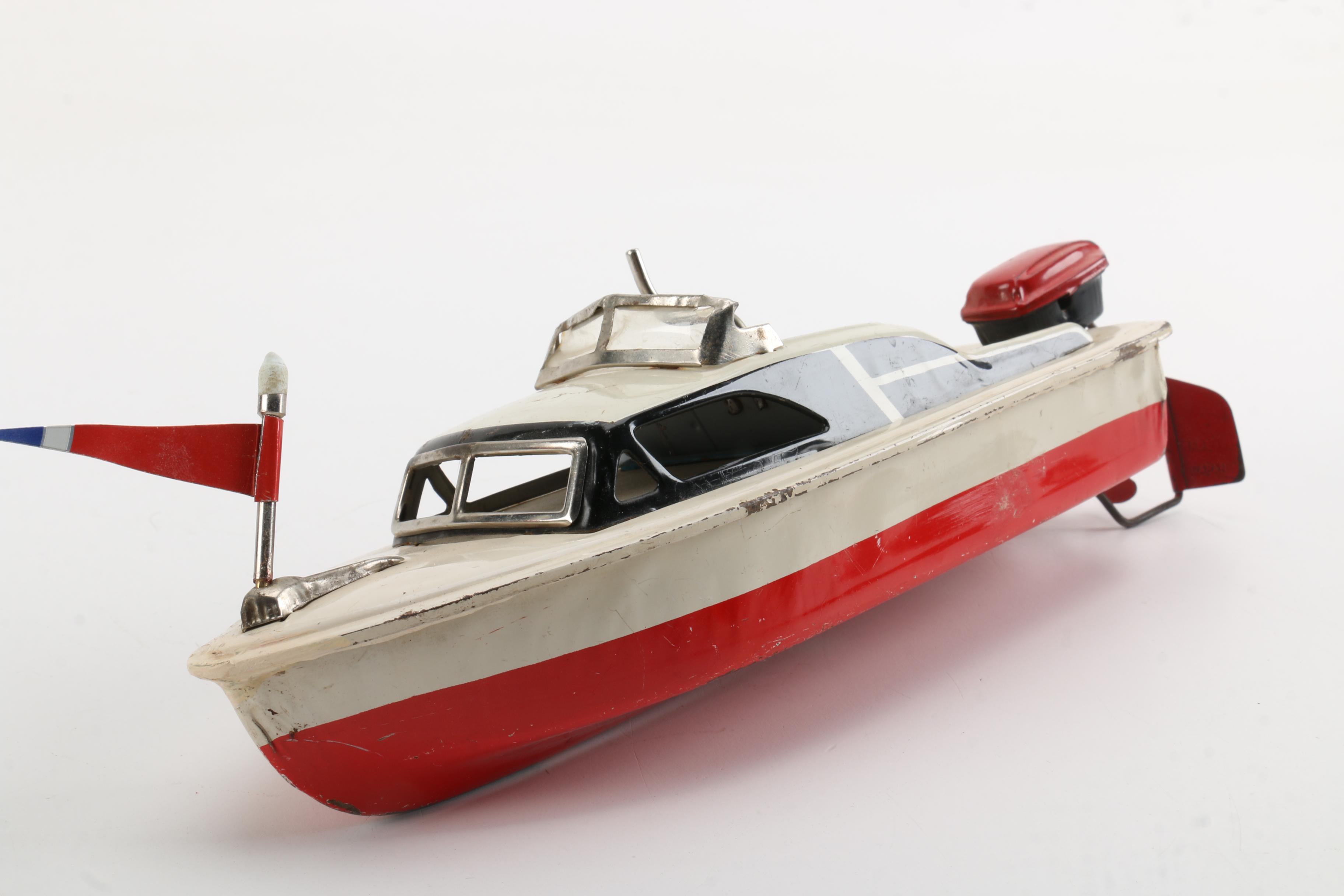 Vintage Wind-Up Speed Boat Toy With Stand