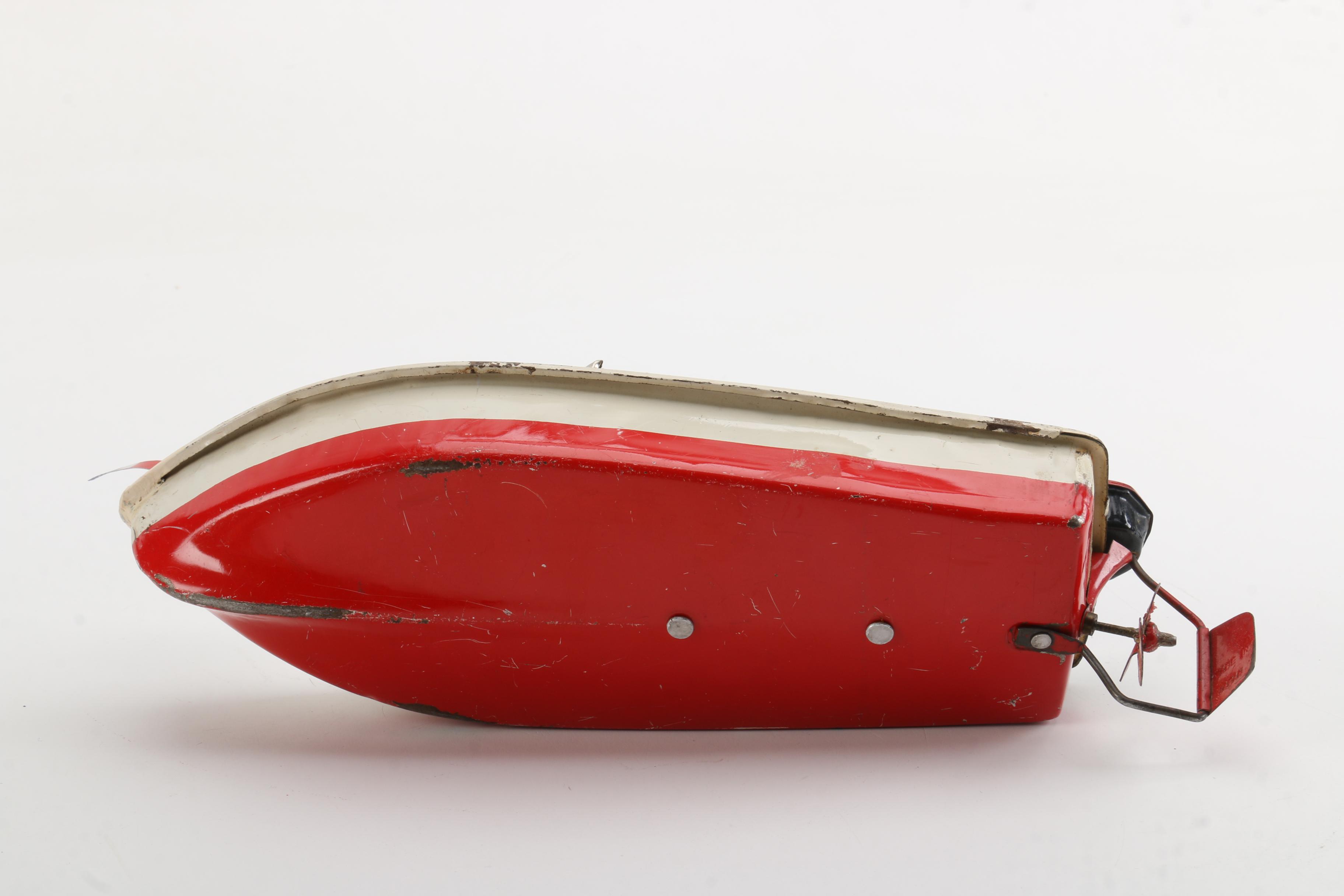 Vintage Wind-Up Speed Boat Toy With Stand