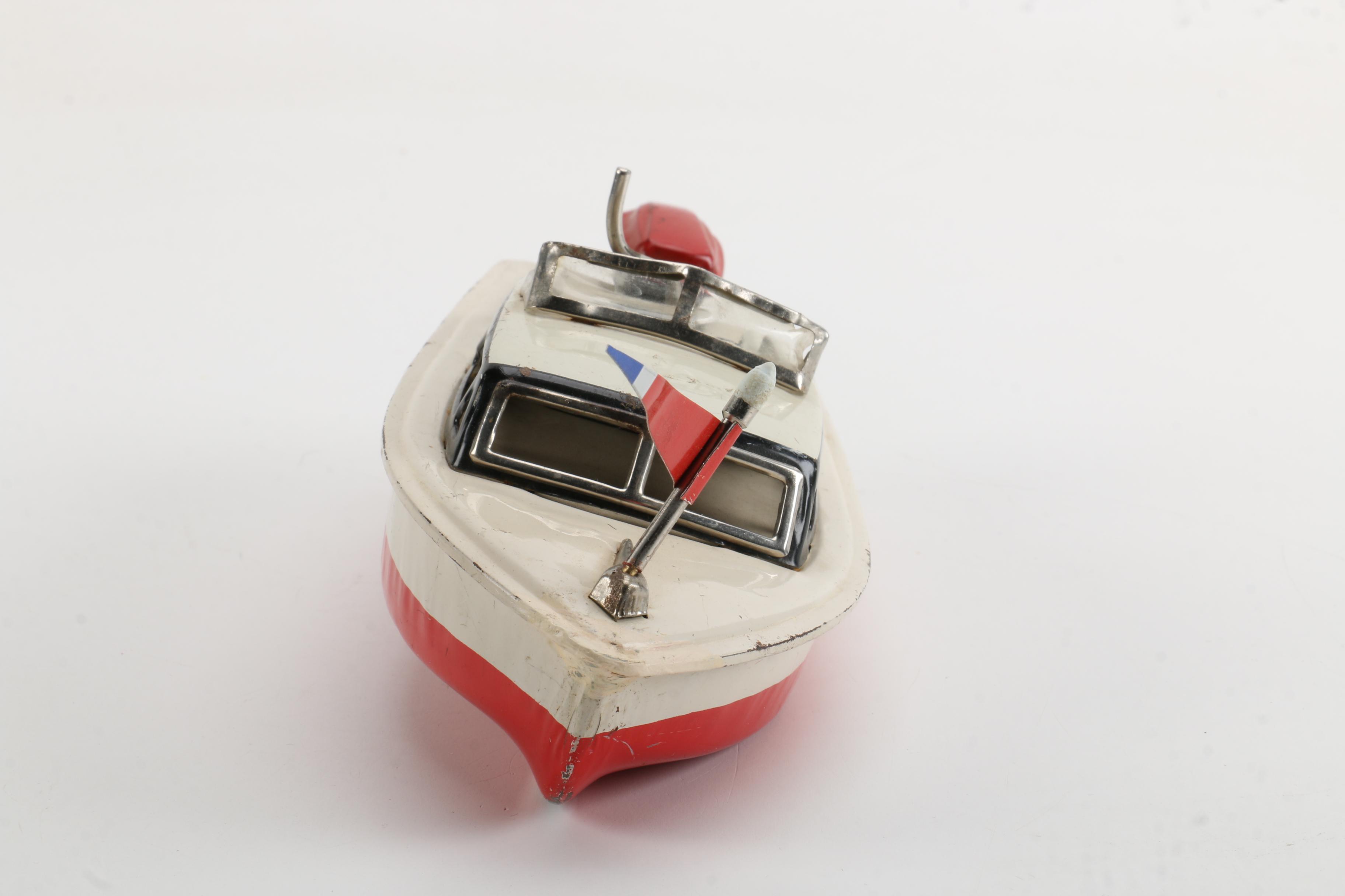 Vintage Wind-Up Speed Boat Toy With Stand