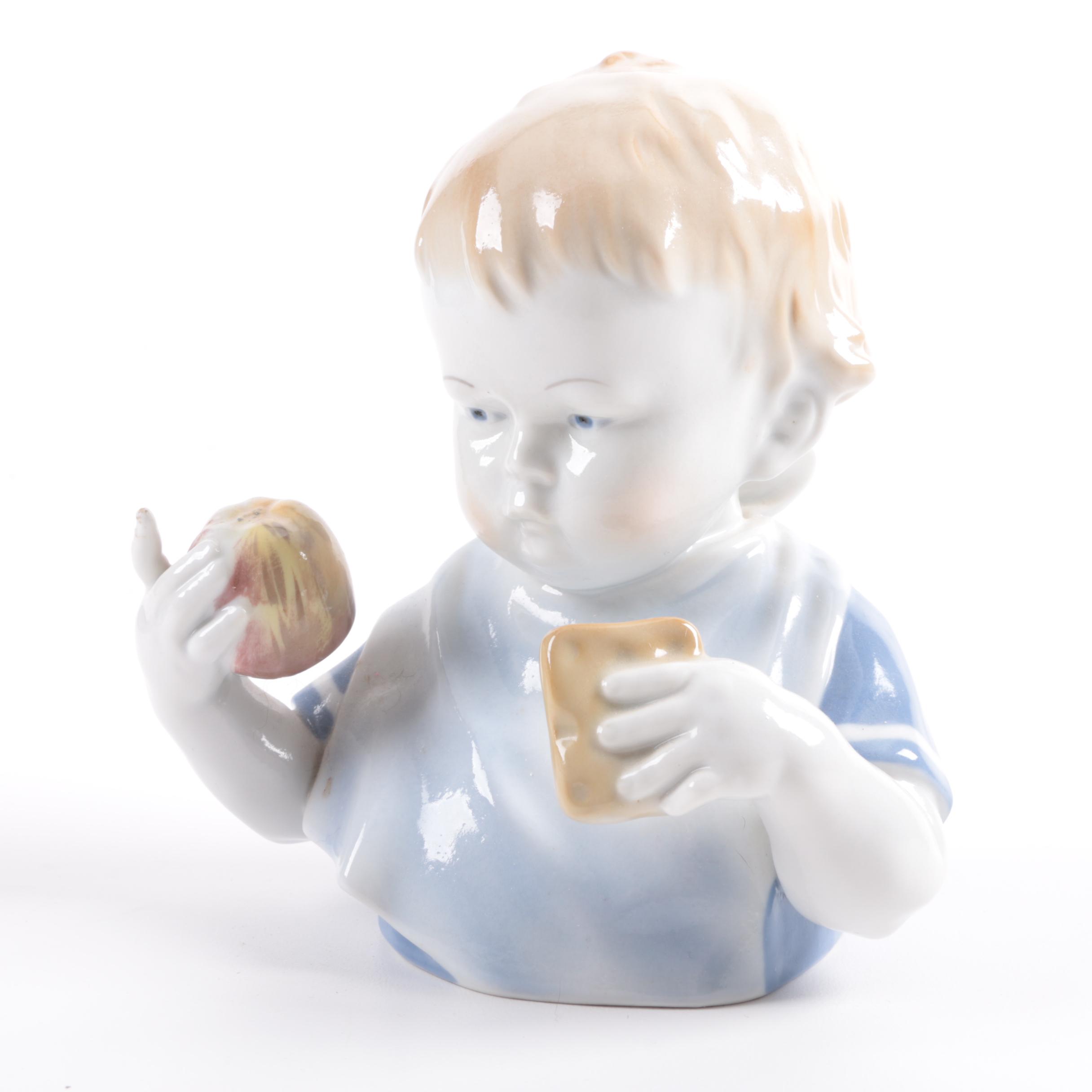 German Porcelain Figurine of a Young Child