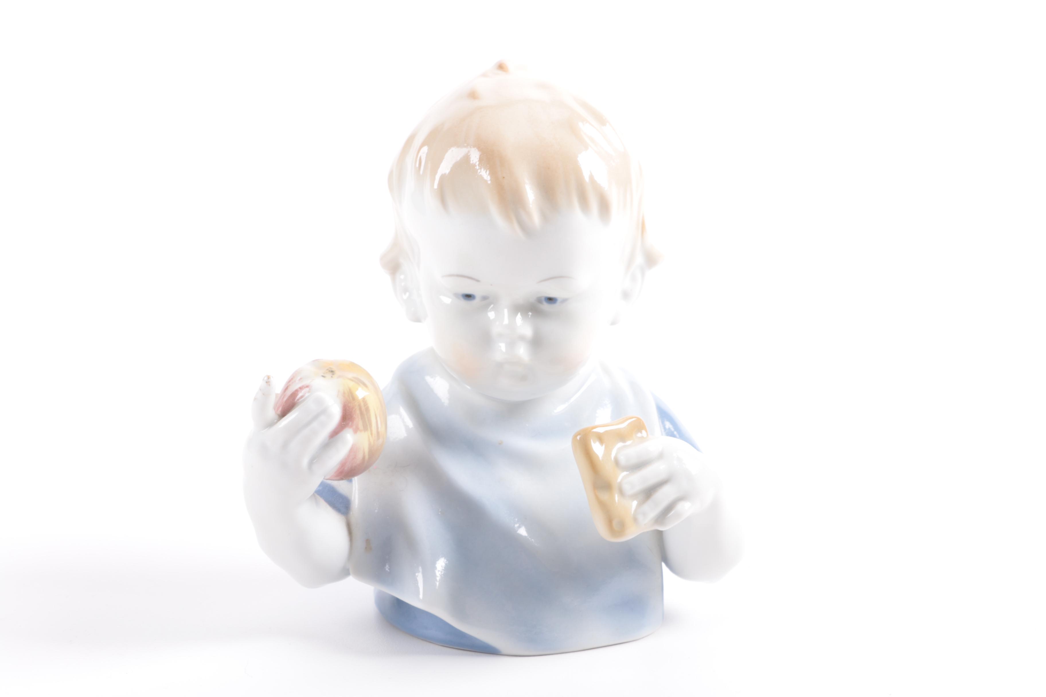 German Porcelain Figurine of a Young Child