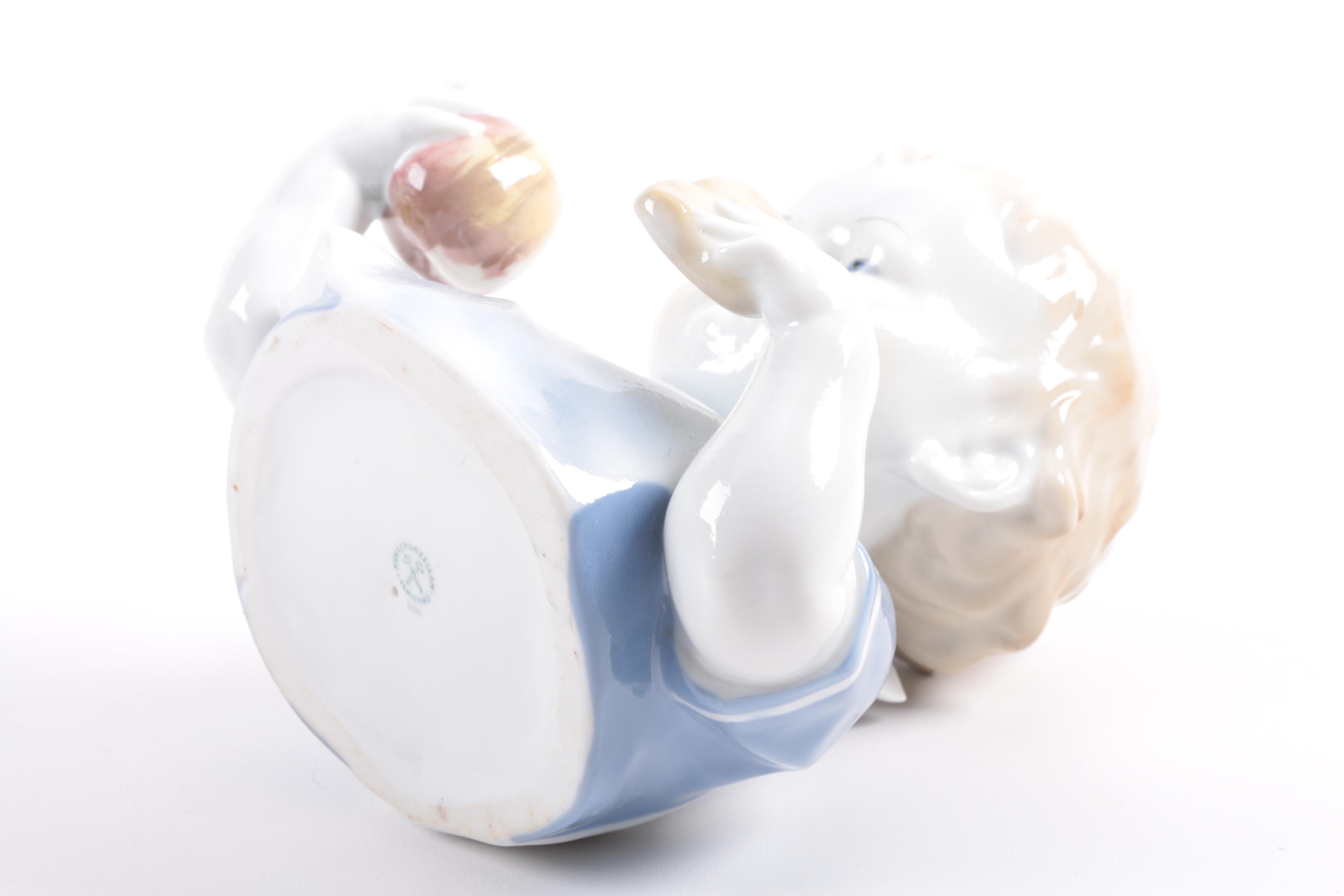 German Porcelain Figurine of a Young Child