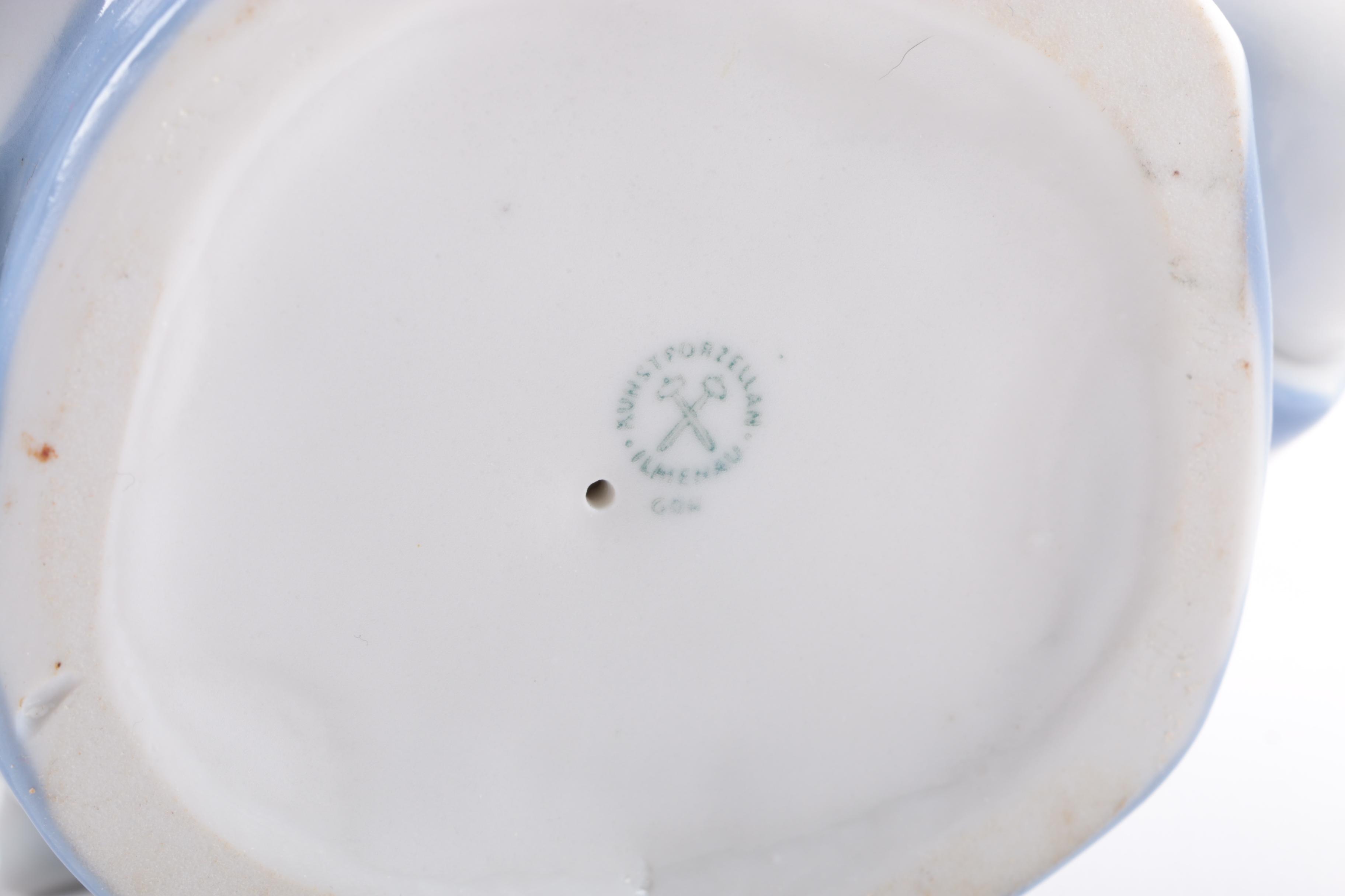 German Porcelain Figurine of a Young Child