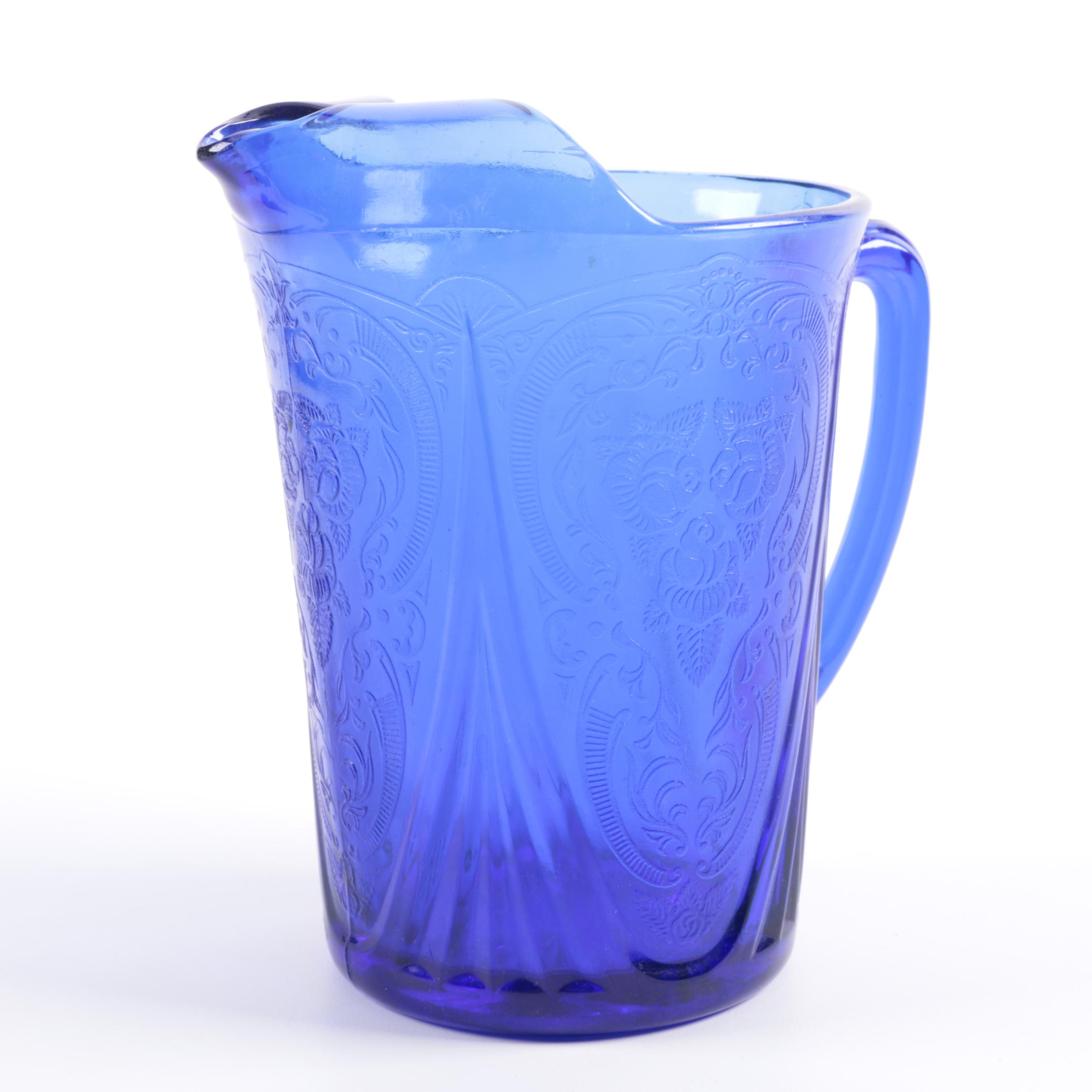 Pressed Blue Glass Rose and Scrolled Foliate Motif Pitcher