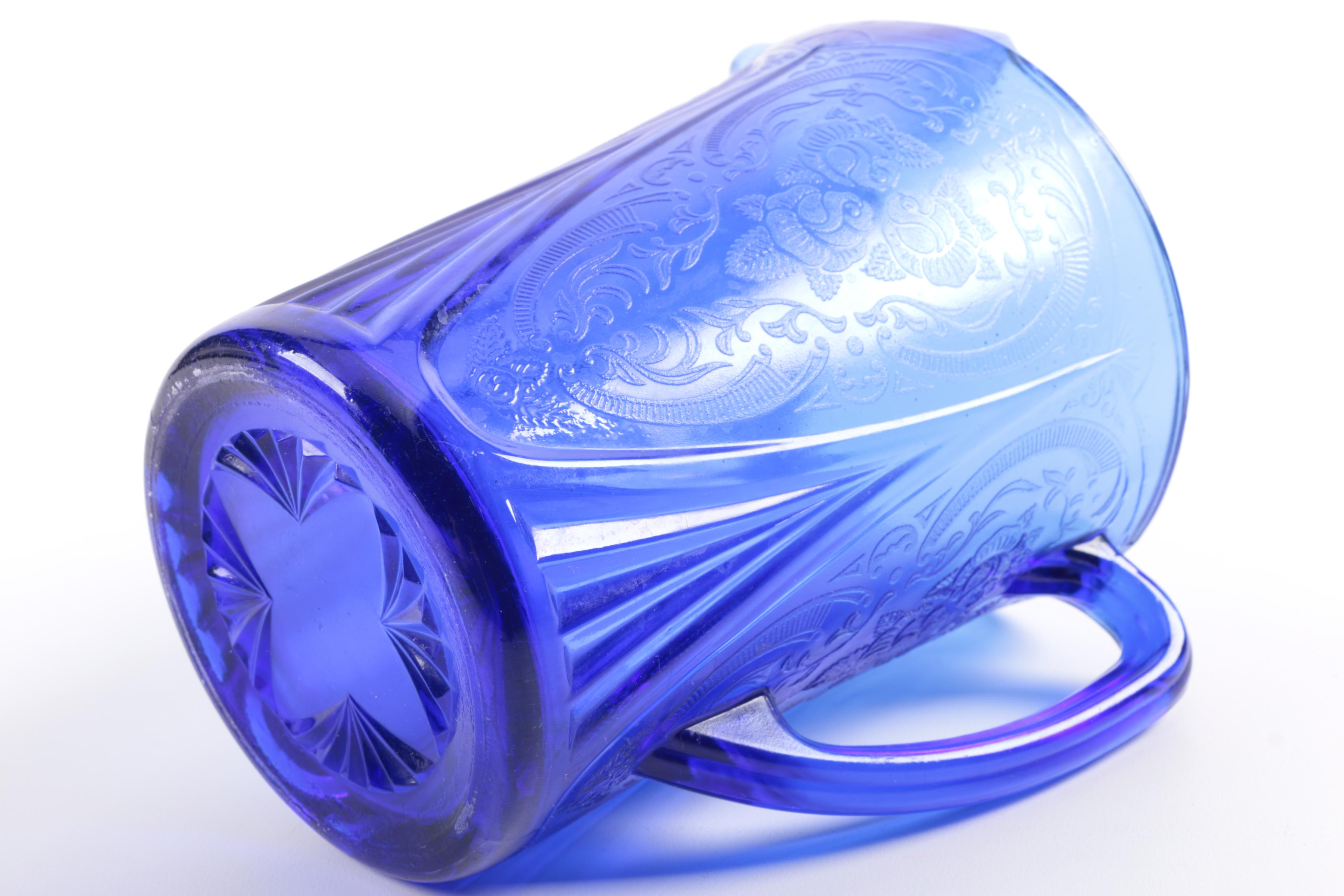 Pressed Blue Glass Rose and Scrolled Foliate Motif Pitcher