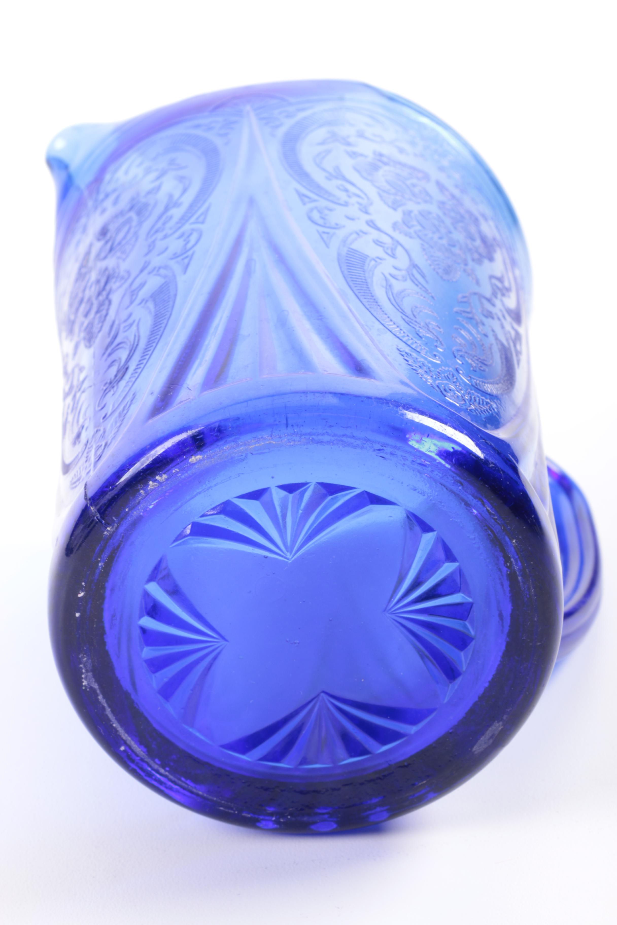 Pressed Blue Glass Rose and Scrolled Foliate Motif Pitcher