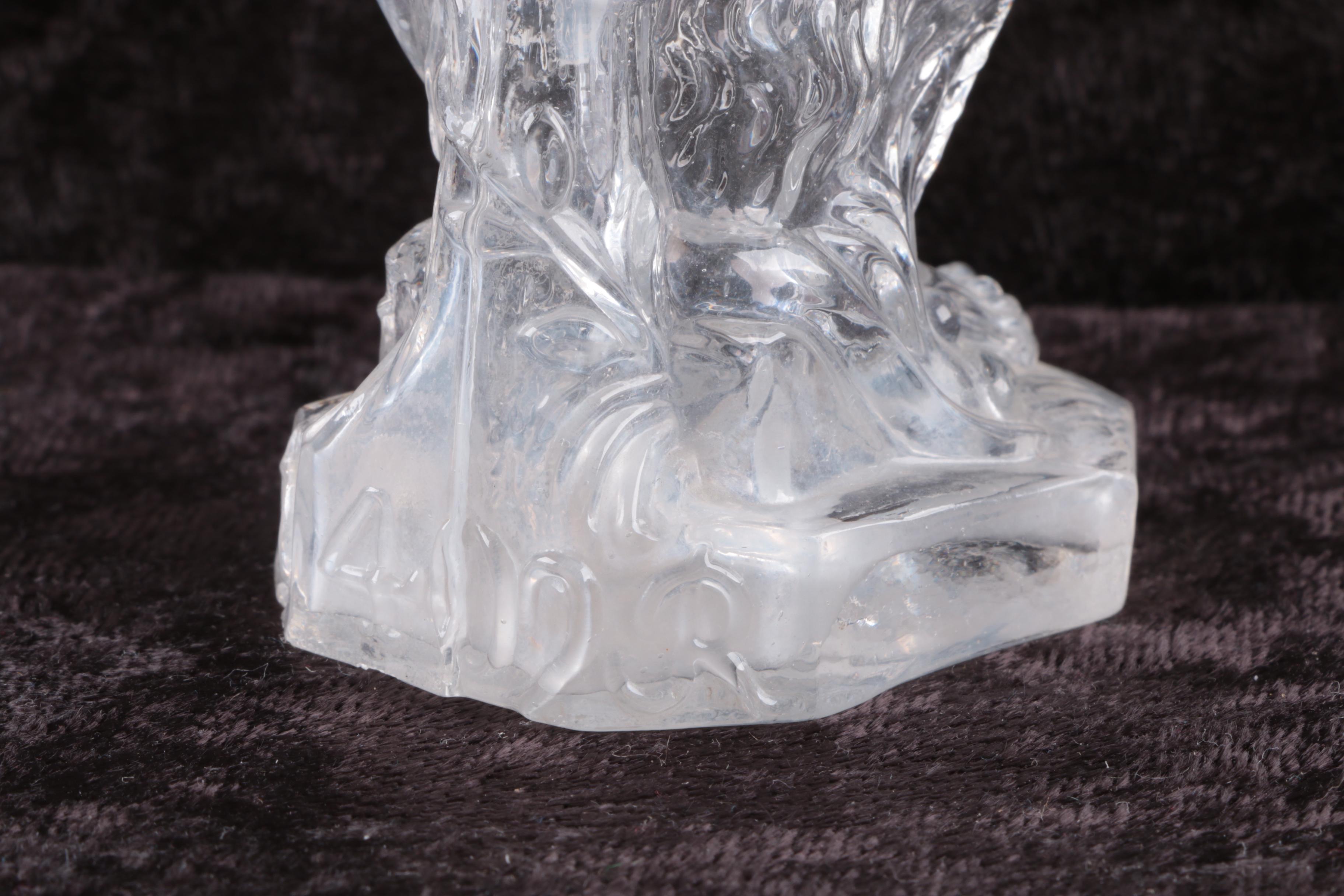 Molded Glass Lion Bottle