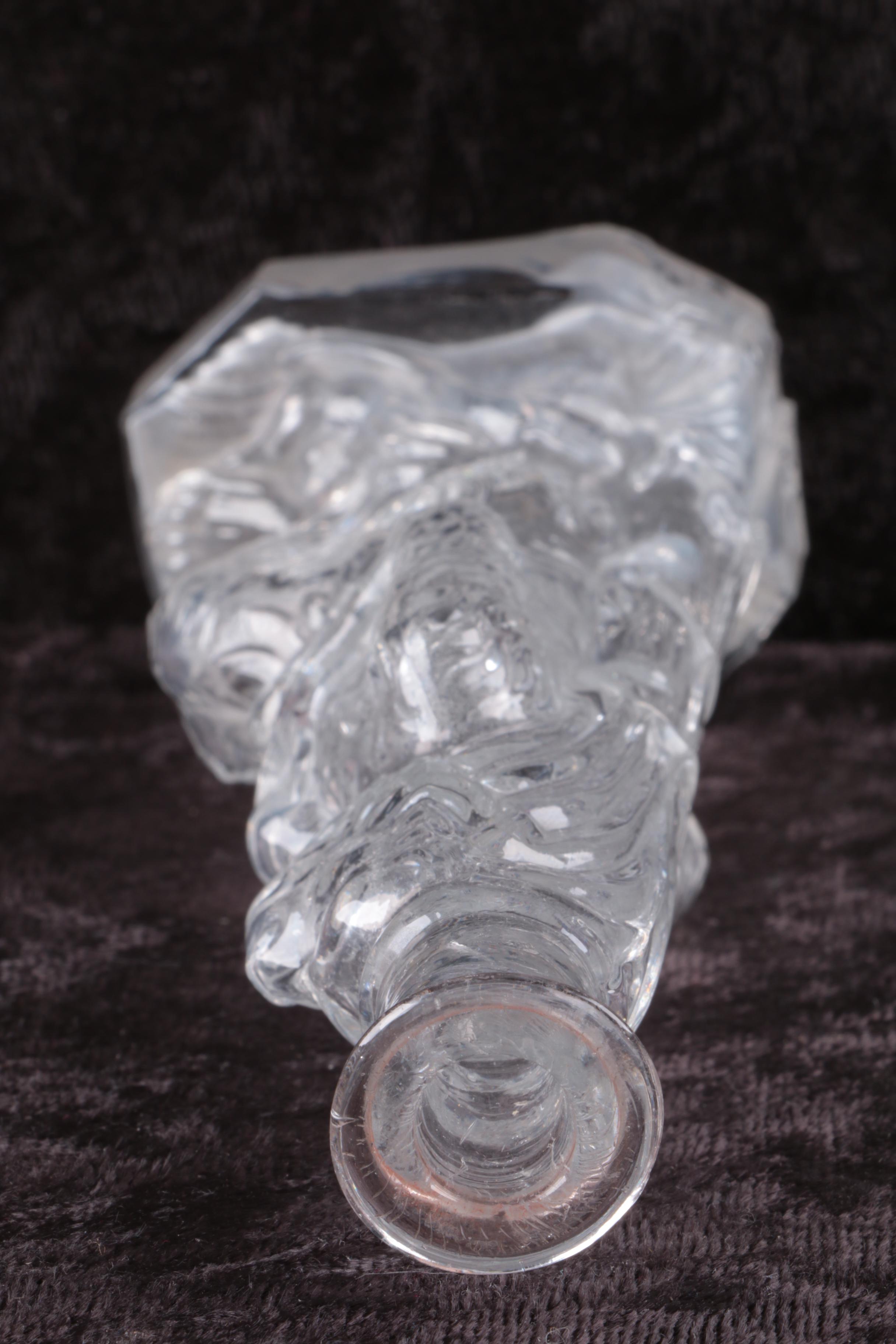 Molded Glass Lion Bottle