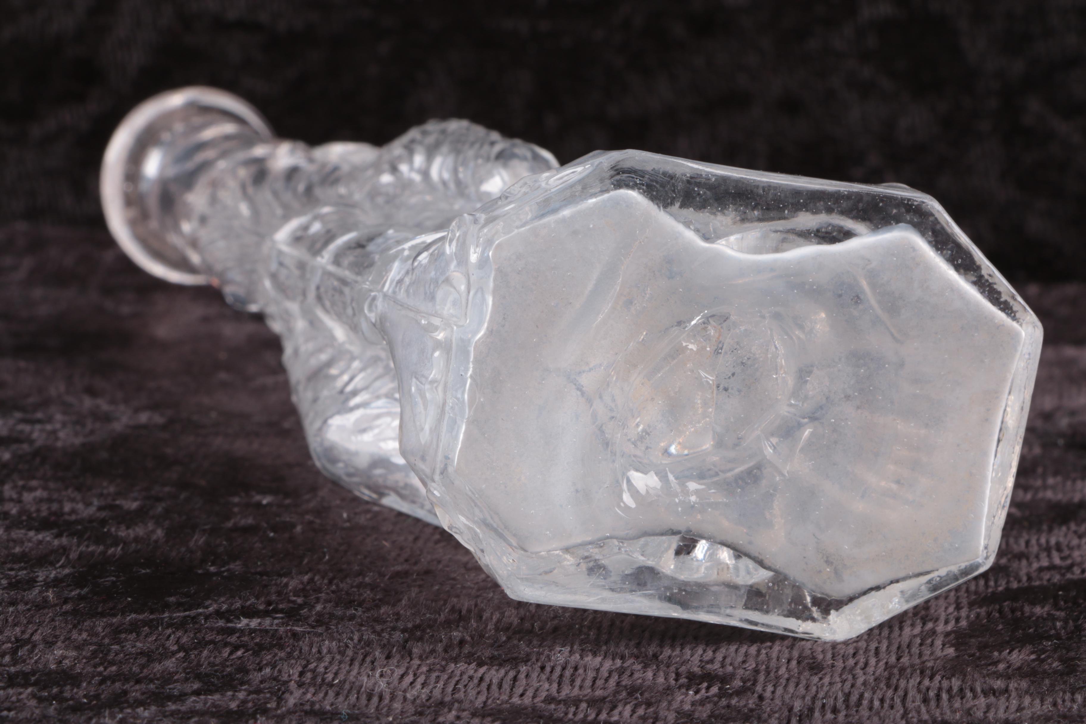 Molded Glass Lion Bottle