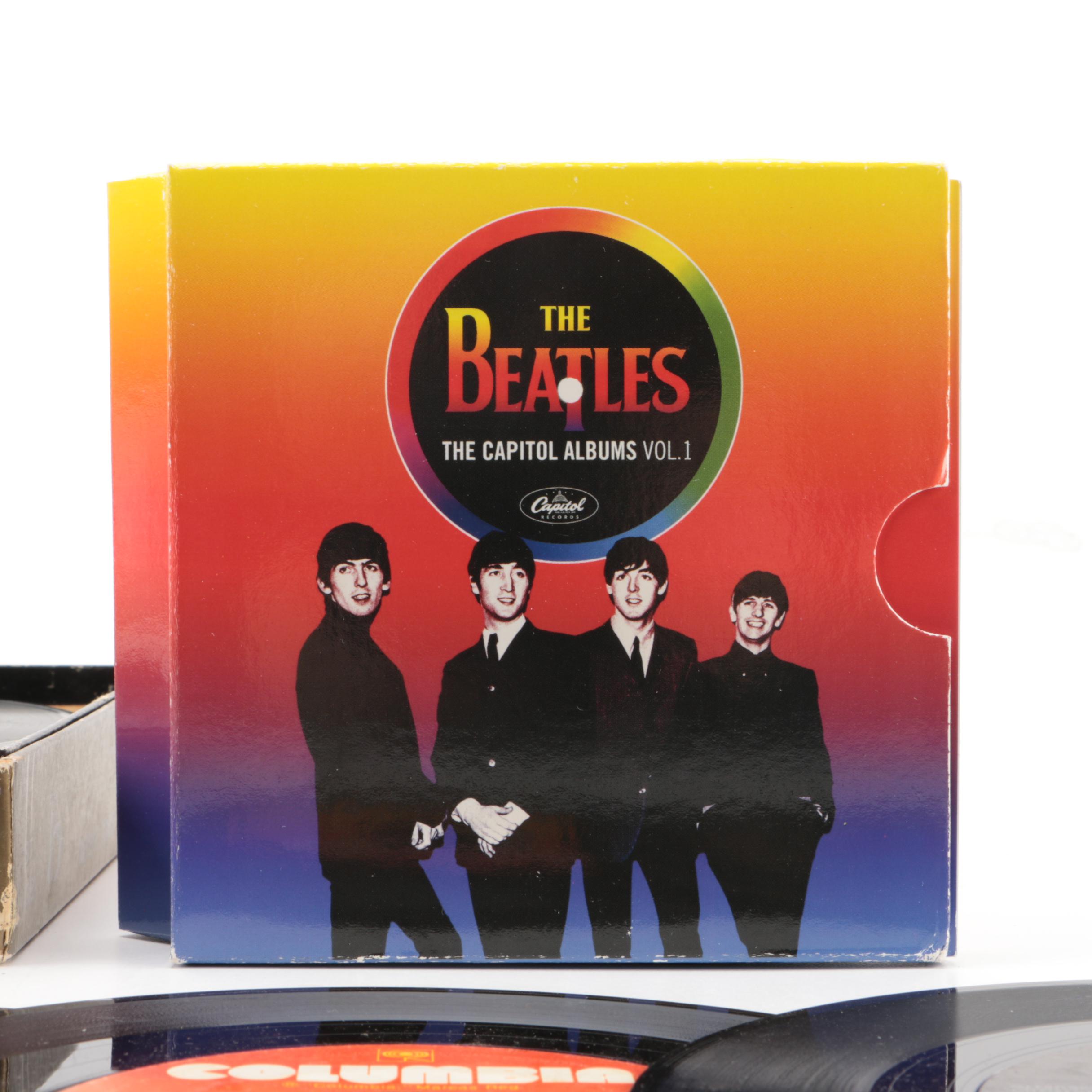 Vintage 45 rpm Records and The Beatles "The Capitol Albums Vol. 1" CD Box Set