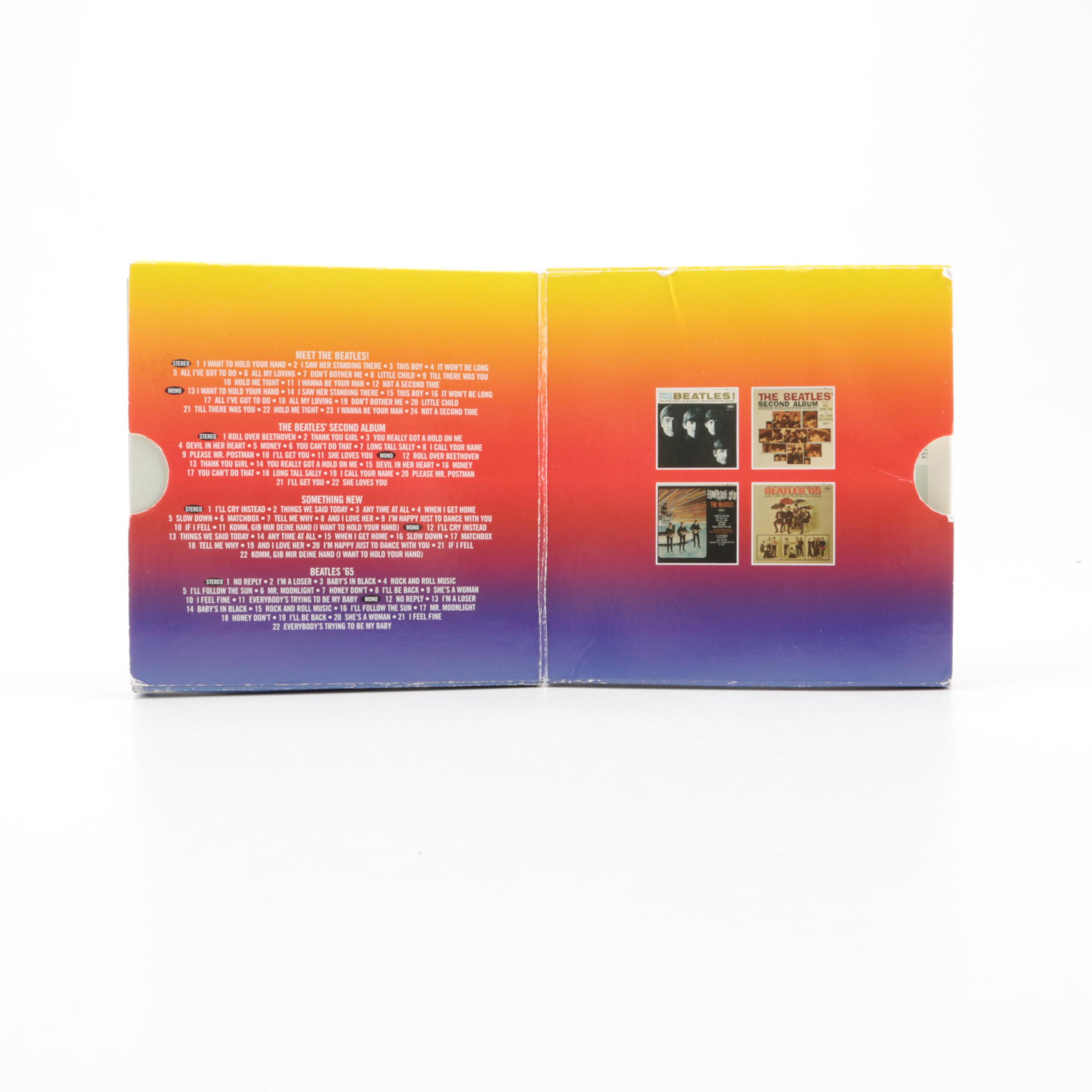 Vintage 45 rpm Records and The Beatles "The Capitol Albums Vol. 1" CD Box Set