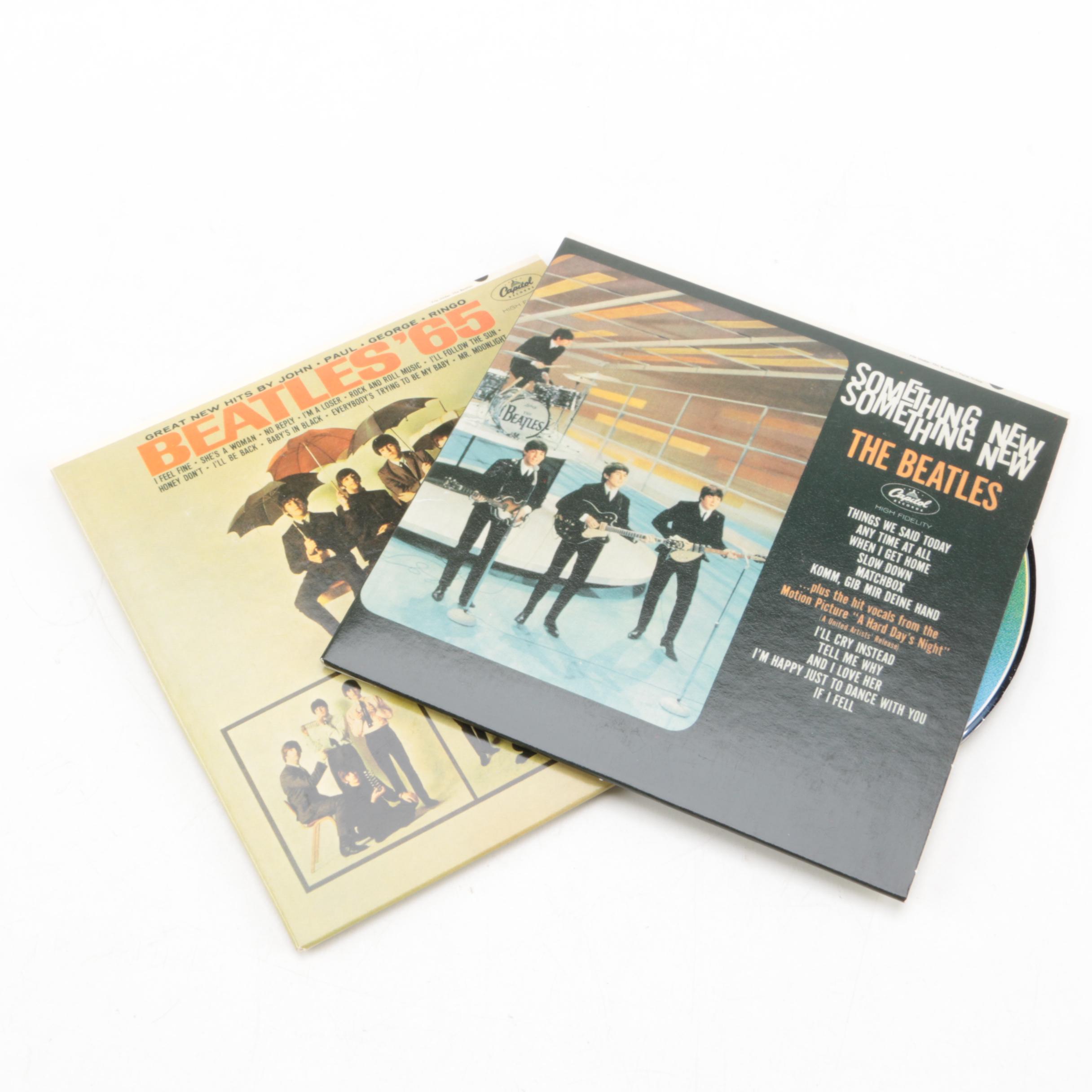 Vintage 45 rpm Records and The Beatles "The Capitol Albums Vol. 1" CD Box Set