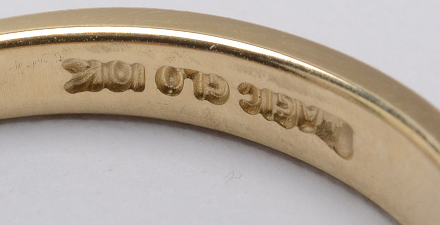 Magic Glo 10K Yellow Gold Channel Set Diamond Band