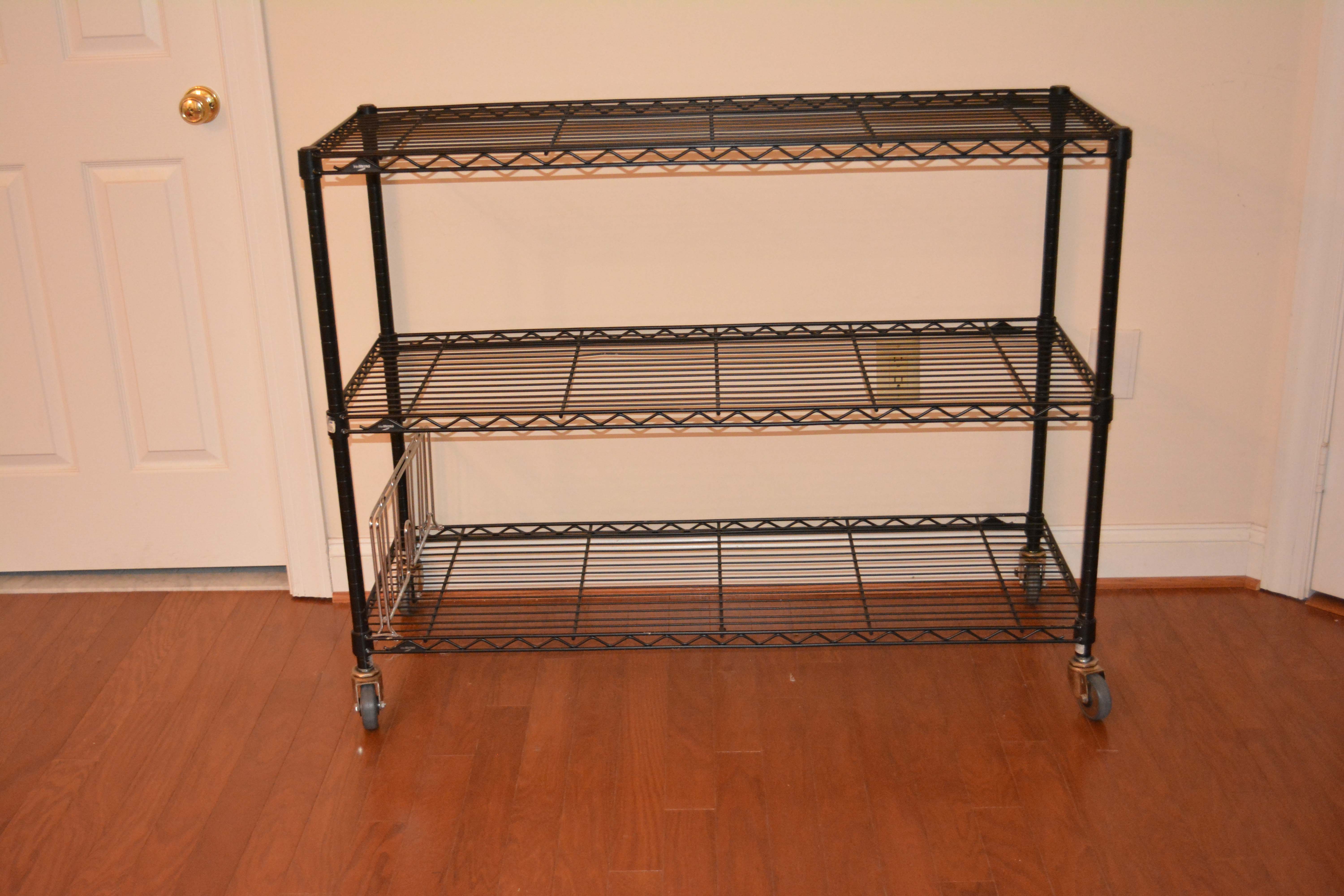 Three Black InterMetro Rolling Shelving and Cart