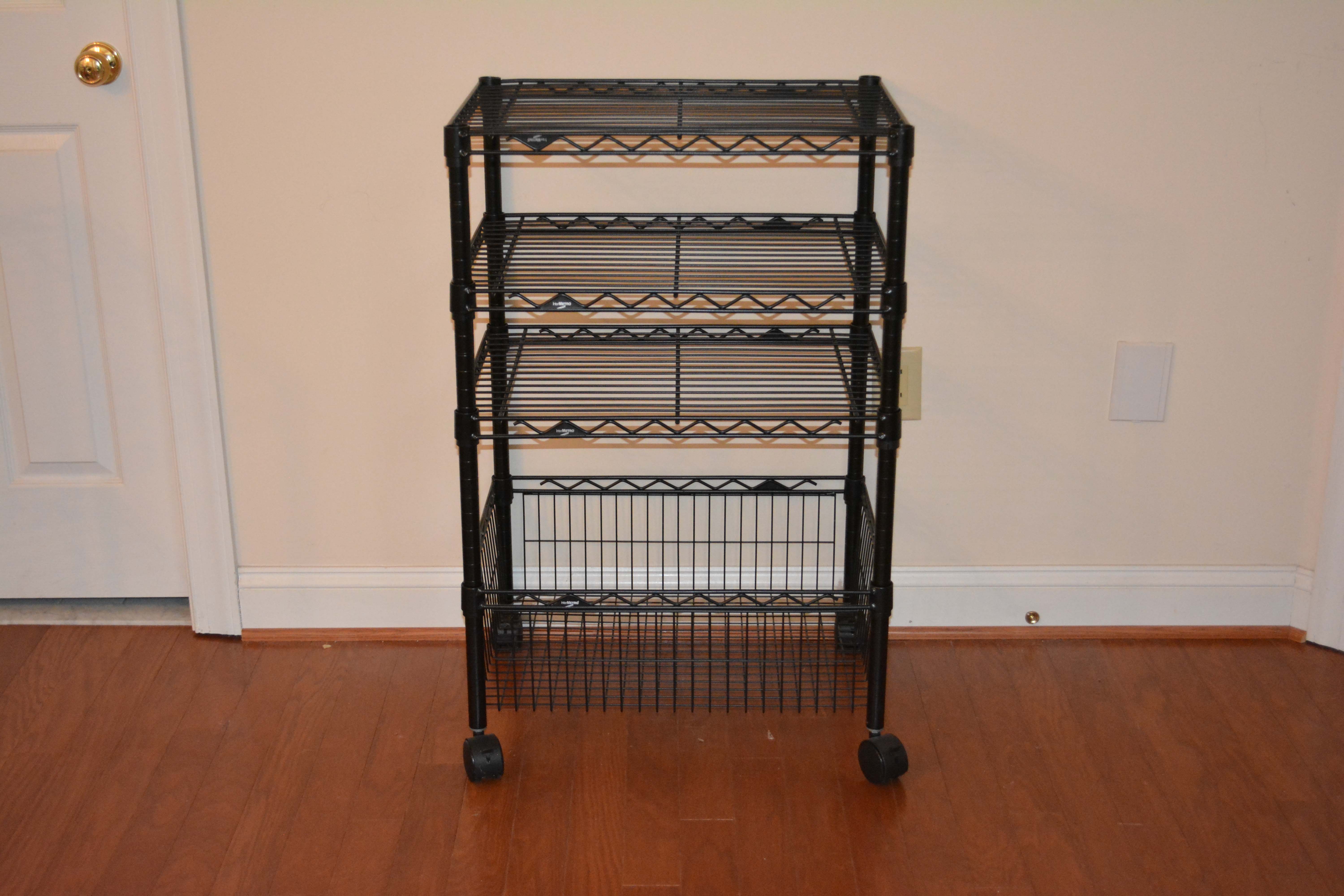 Three Black InterMetro Rolling Shelving and Cart