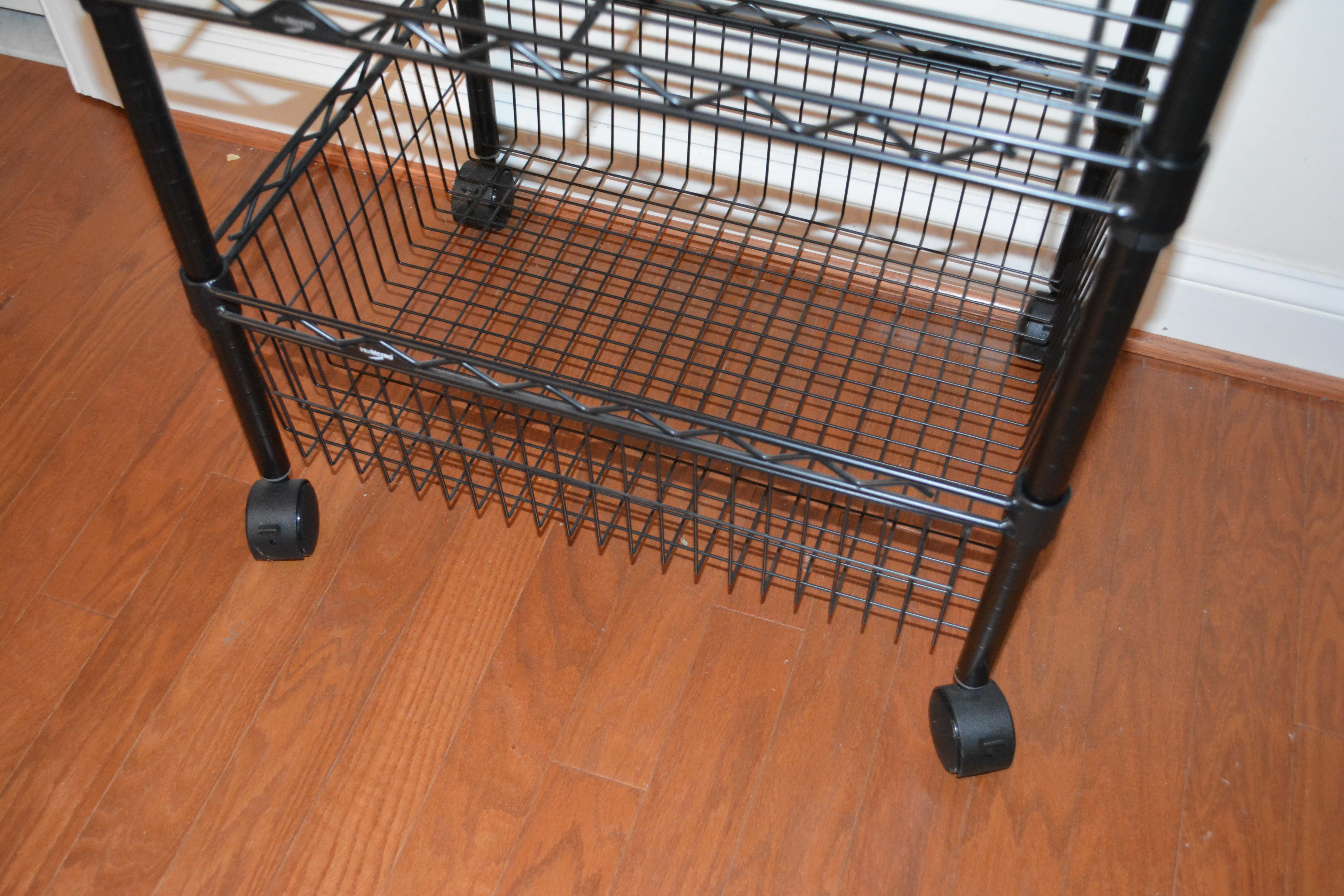 Three Black InterMetro Rolling Shelving and Cart