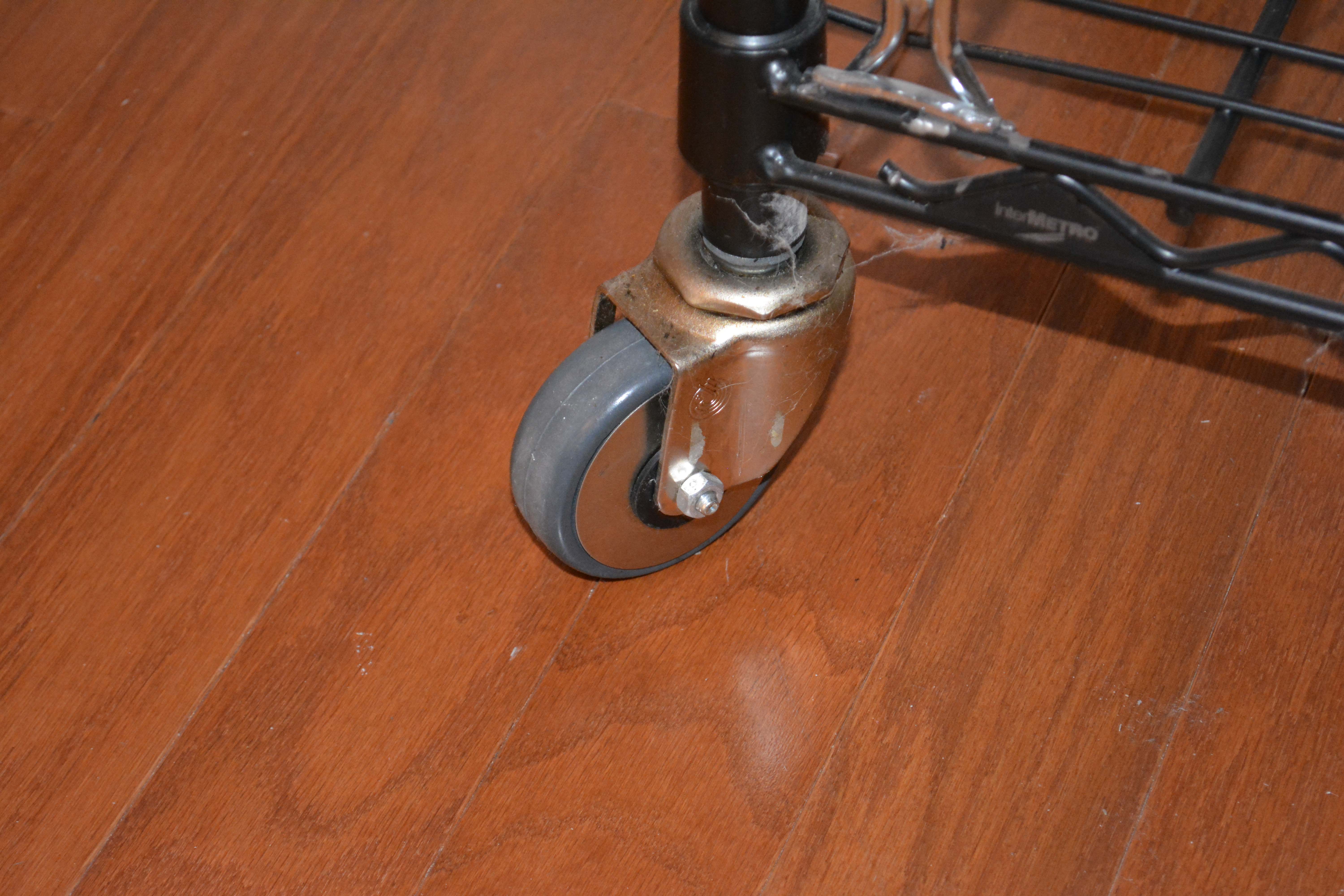 Three Black InterMetro Rolling Shelving and Cart