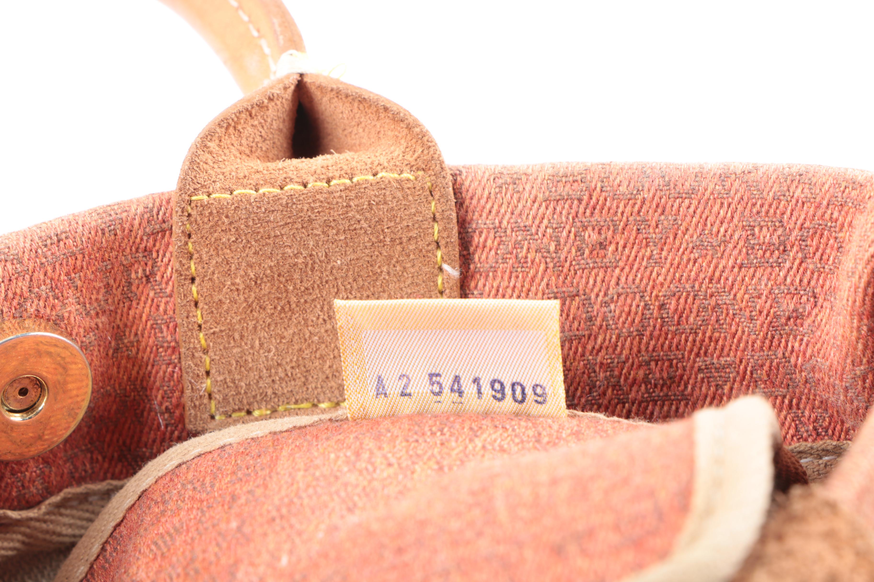 Dooney & Bourke Signature Handbags