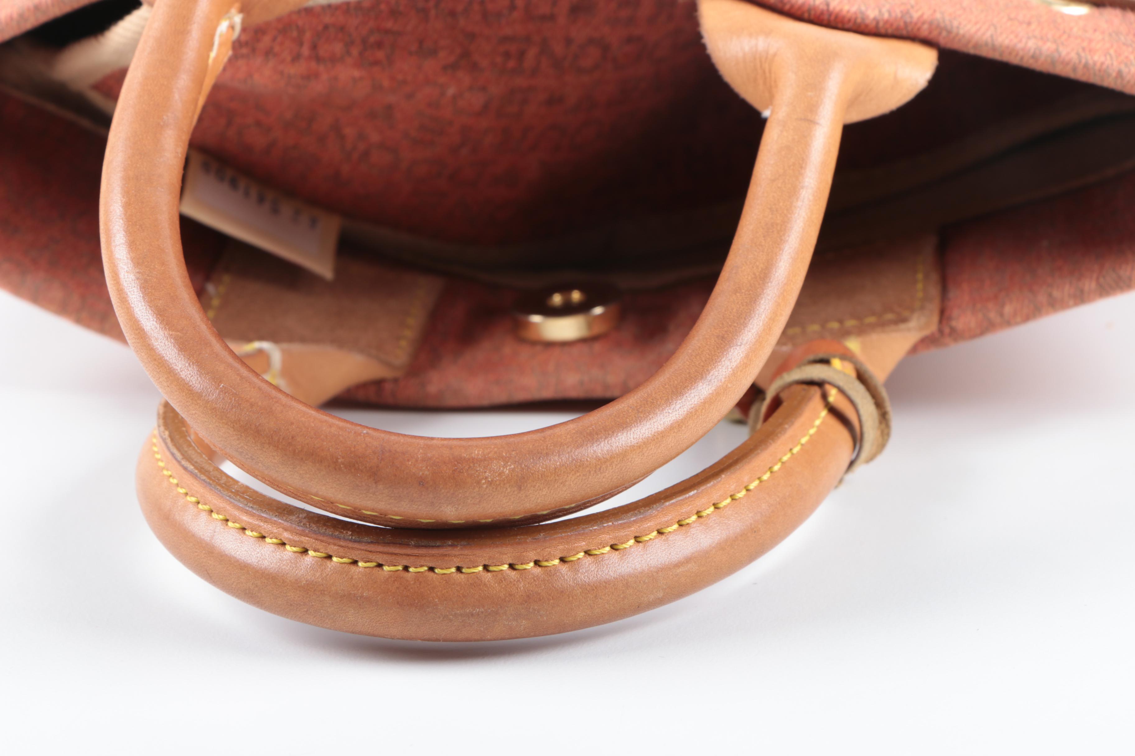 Dooney & Bourke Signature Handbags