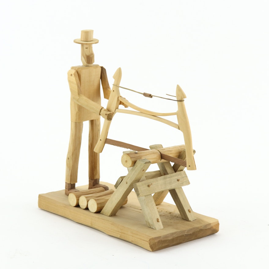 Donnie Brown Wood Sculpture of Man with Saw