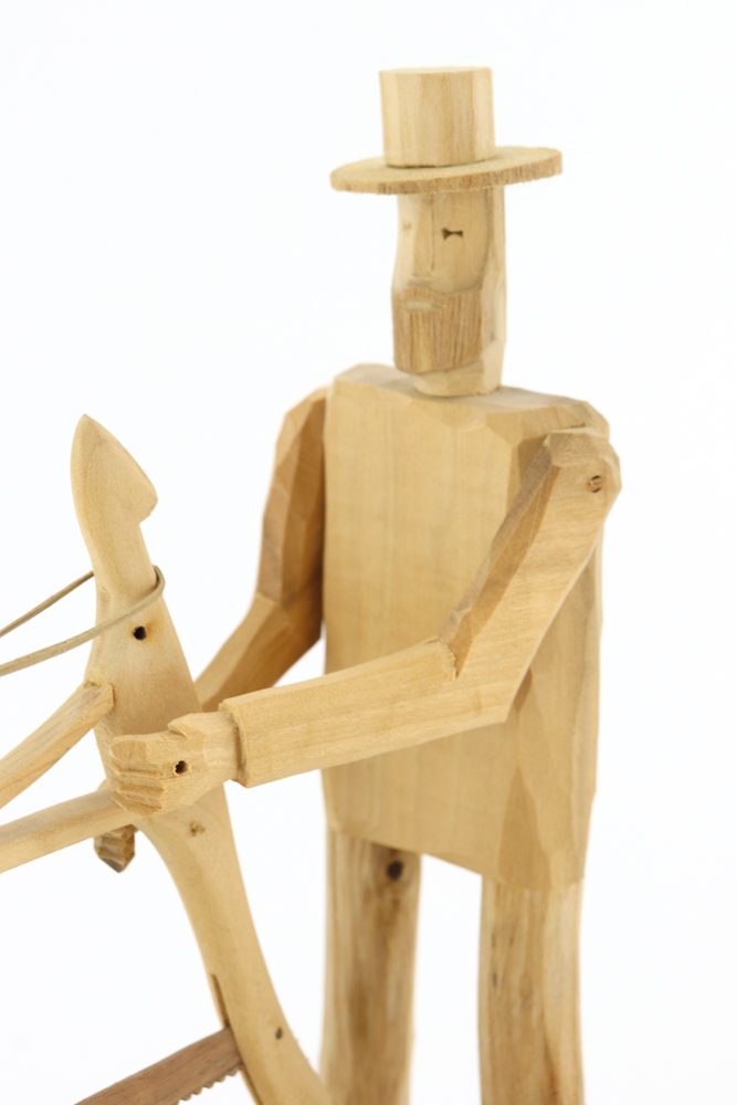 Donnie Brown Wood Sculpture of Man with Saw