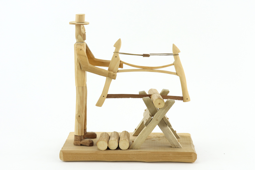 Donnie Brown Wood Sculpture of Man with Saw