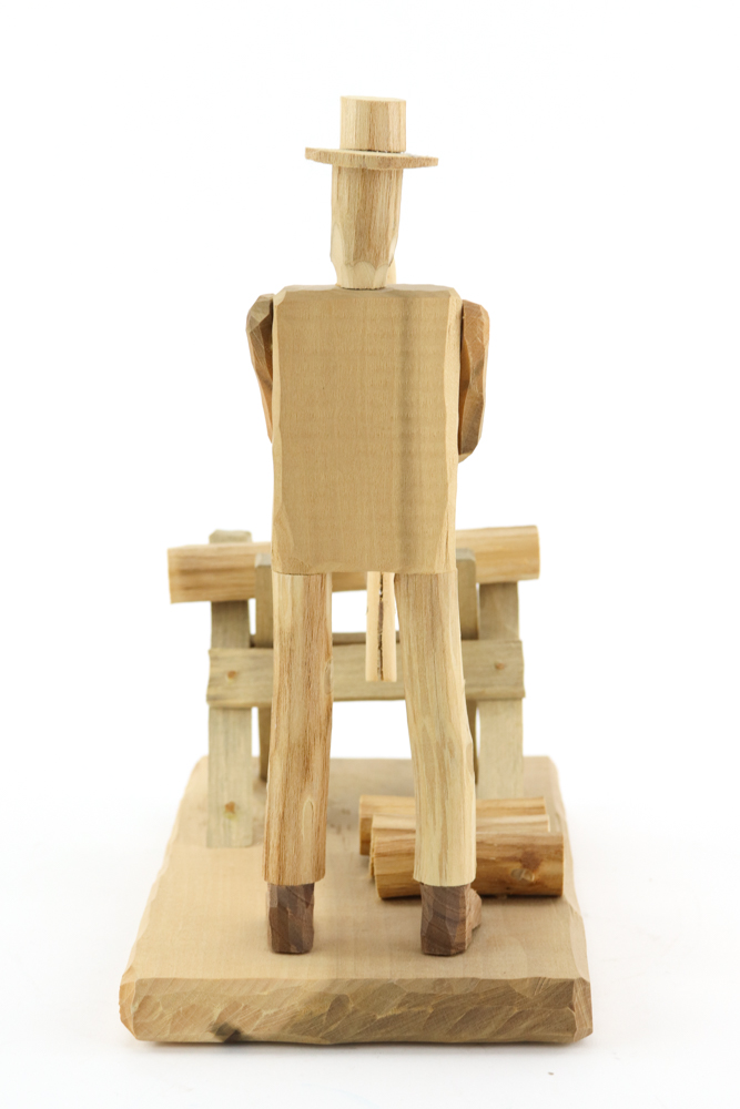 Donnie Brown Wood Sculpture of Man with Saw