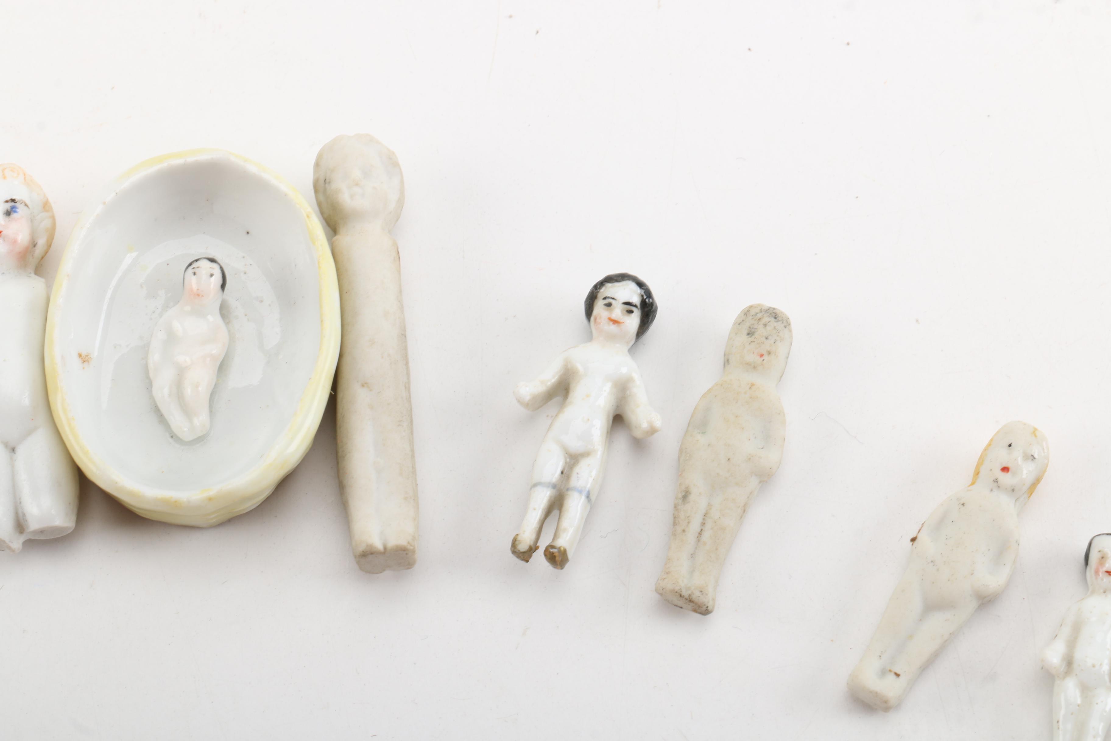 Antique Miniature Frozen and Pin-Jointed Porcelain Dolls