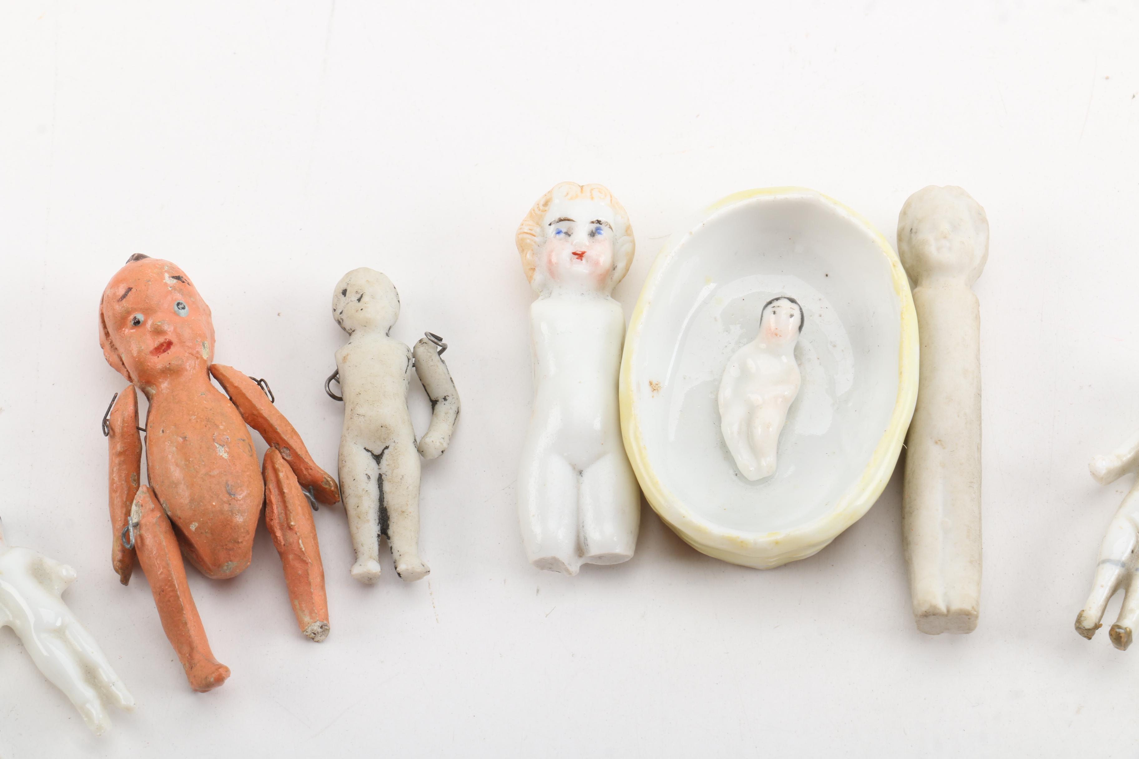 Antique Miniature Frozen and Pin-Jointed Porcelain Dolls